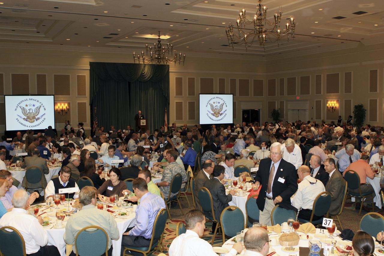 CAPE CANAVERAL Fla. -- Attendees filled the room for the National Space Club Florida Committee, or NSCFL, luncheon May 14 at the Radisson Resort at the Port in Cape Canaveral, Fla. Kennedy Space Center Director Bob Cabana was the featured speaker with a presentation on the Fiscal Year 2014 budget and Kennedy’s path forward.     The NSCFL Committee is one of three regional committees including Huntsville, Ala. and Los Angeles, Calif. of the National Space Club in Washington, D.C. The NSCFL Committee promotes awareness through hosting monthly luncheons, sponsoring educational opportunities, recognizing significant achievement, and promoting aerospace leadership in a region heavily influenced by aerospace activities.  Photo credit: NASA/Jim Grossmann