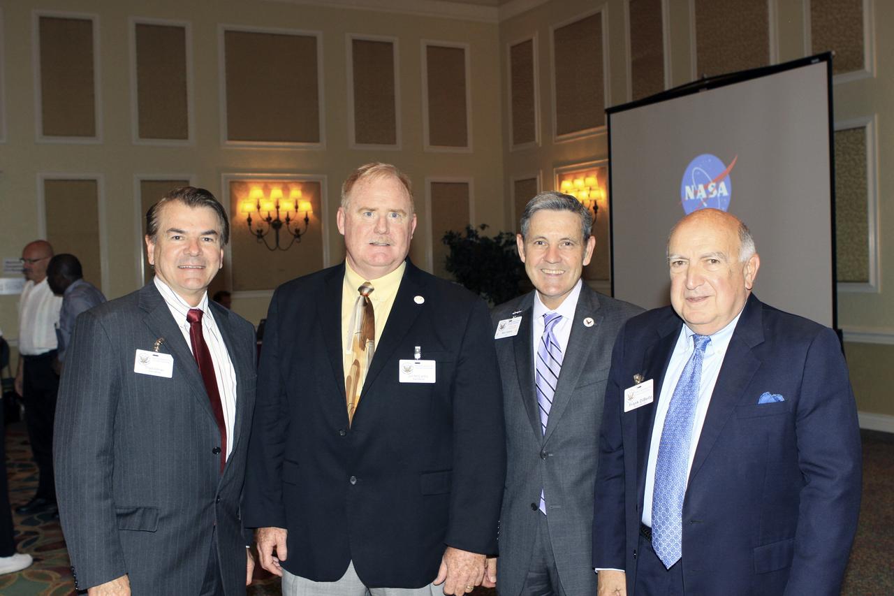 CAPE CANAVERAL Fla. -- Kennedy Space Center Director Bob Cabana, second from right, spoke to attendees at the National Space Club Florida Committee, or NSCFL, luncheon May 14 at the Radisson Resort at the Port in Cape Canaveral, Fla. Cabana’s presentation focused on the Fiscal Year 2014 budget and Kennedy’s path forward. From the left, are State Senator and Astronaut Memorial Foundation President Thad Altman NSCFL Chairman Jim McCarthy, URS and Frank DiBello, president of Space Florida.     The NSCFL Committee is one of three regional committees including Huntsville, Ala. and Los Angeles, Calif. of the National Space Club in Washington, D.C. The NSCFL Committee promotes awareness through hosting monthly luncheons, sponsoring educational opportunities, recognizing significant achievement, and promoting aerospace leadership in a region heavily influenced by aerospace activities.  Photo credit: NASA/Jim Grossmann