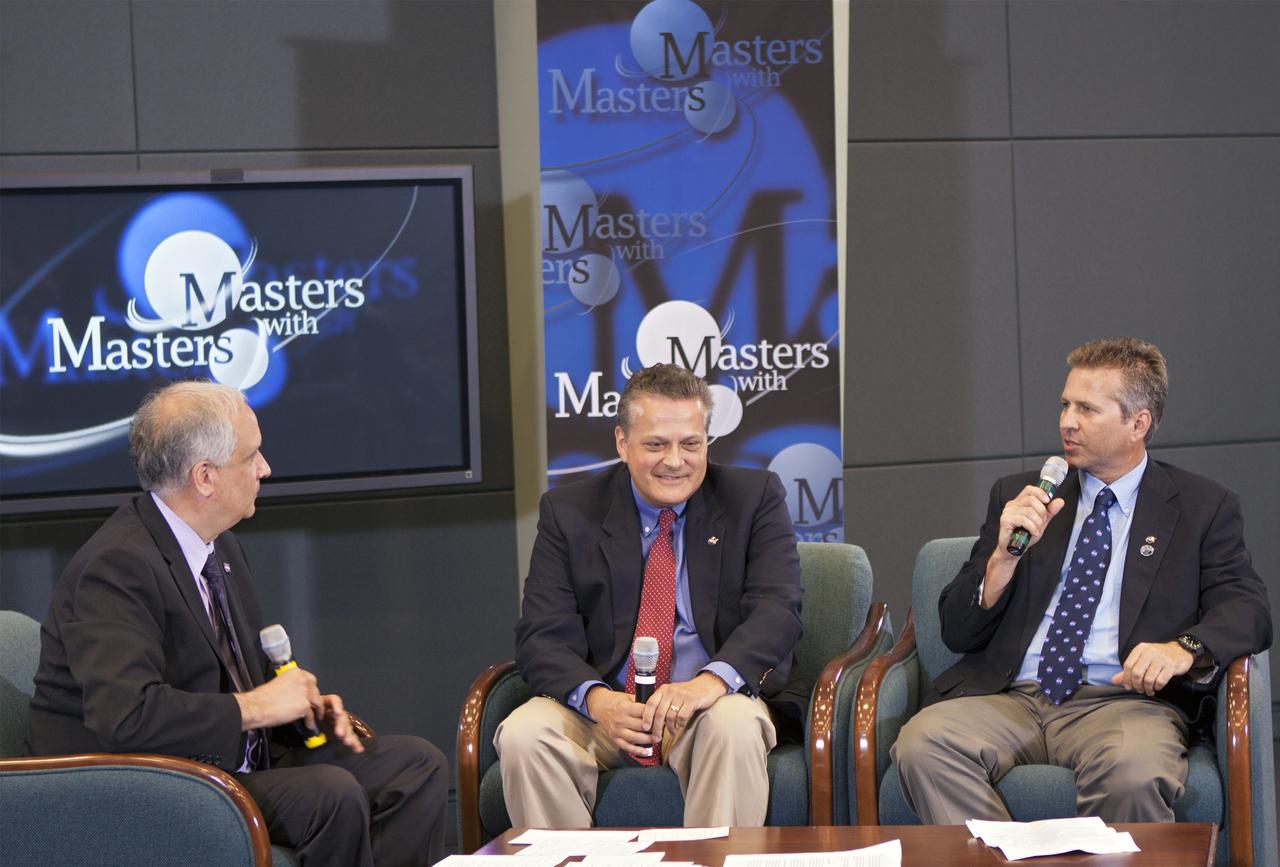 CAPE CANAVERAL, Fla. – Ed Hoffman, from left, Jack Fox and Rob Mueller discuss techniques to enable and enhance innovation during the third session in a weeklong series called "Masters with Masters" at the agency's Kennedy Space Center in Florida. Hoffman, NASA's chief Knowledge officer, Fox, chief, Surface Systems Office, and Rob Mueller, senior technologist, Surface Systems Office, talked about the work of the Swamp Works facility at Kennedy. Photo credit: NASA/Jim Grossmann