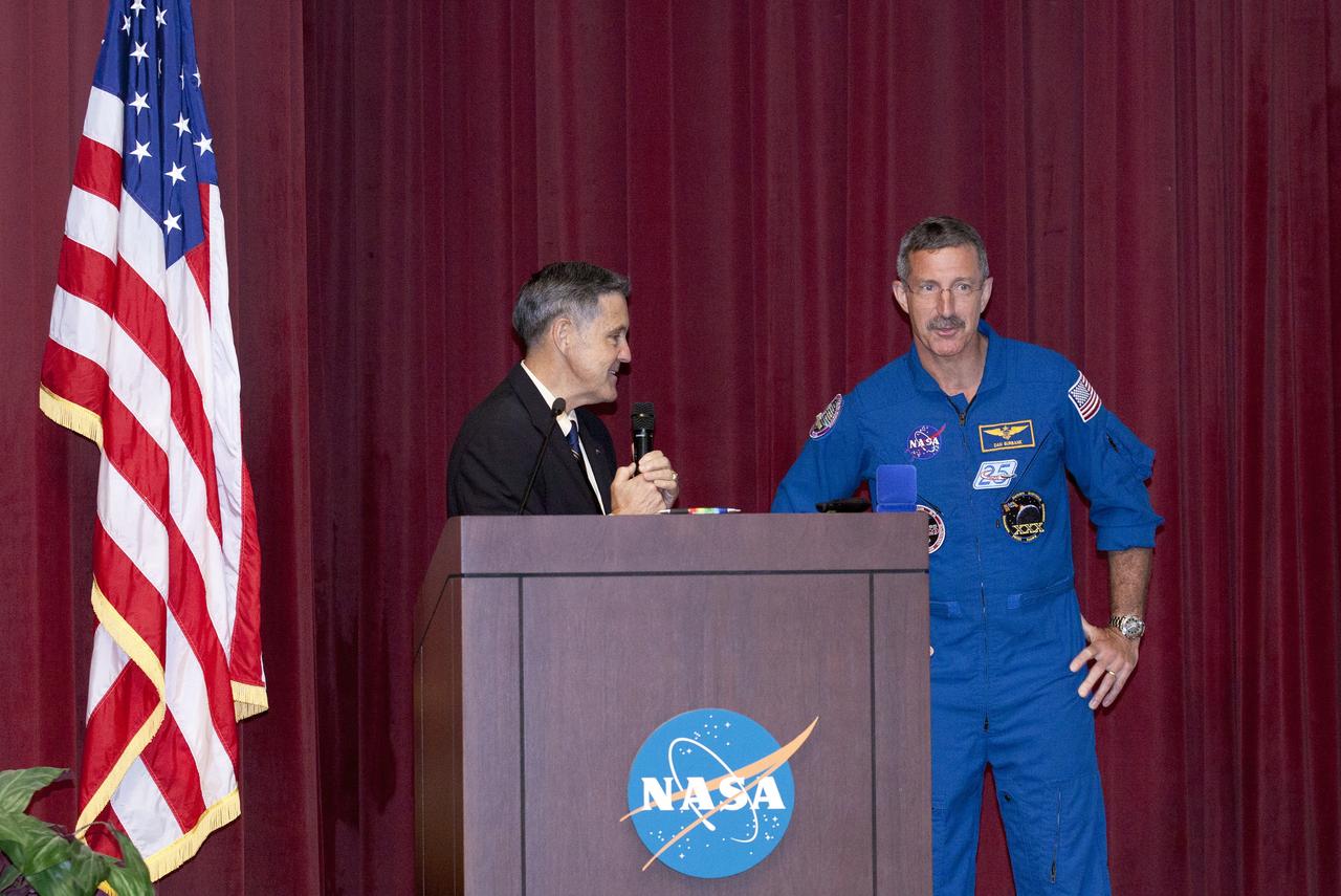 CAPE CANAVERAL, Fla. – Bob Cabana, director of NASA's Kennedy Space Center in Florida and a former space shuttle commander, left, introduces NASA astronaut Dan Burbank to speak to Kennedy employees about his experiences aboard the International Space Station.      Burbank spent 165 days aboard the station during expeditions 29 and 30. For more information on the space station, visit http://www.nasa.gov/mission_pages/station/expeditions/index.html  Photo credit: NASA/Kim Shiflett & Gianni Woods