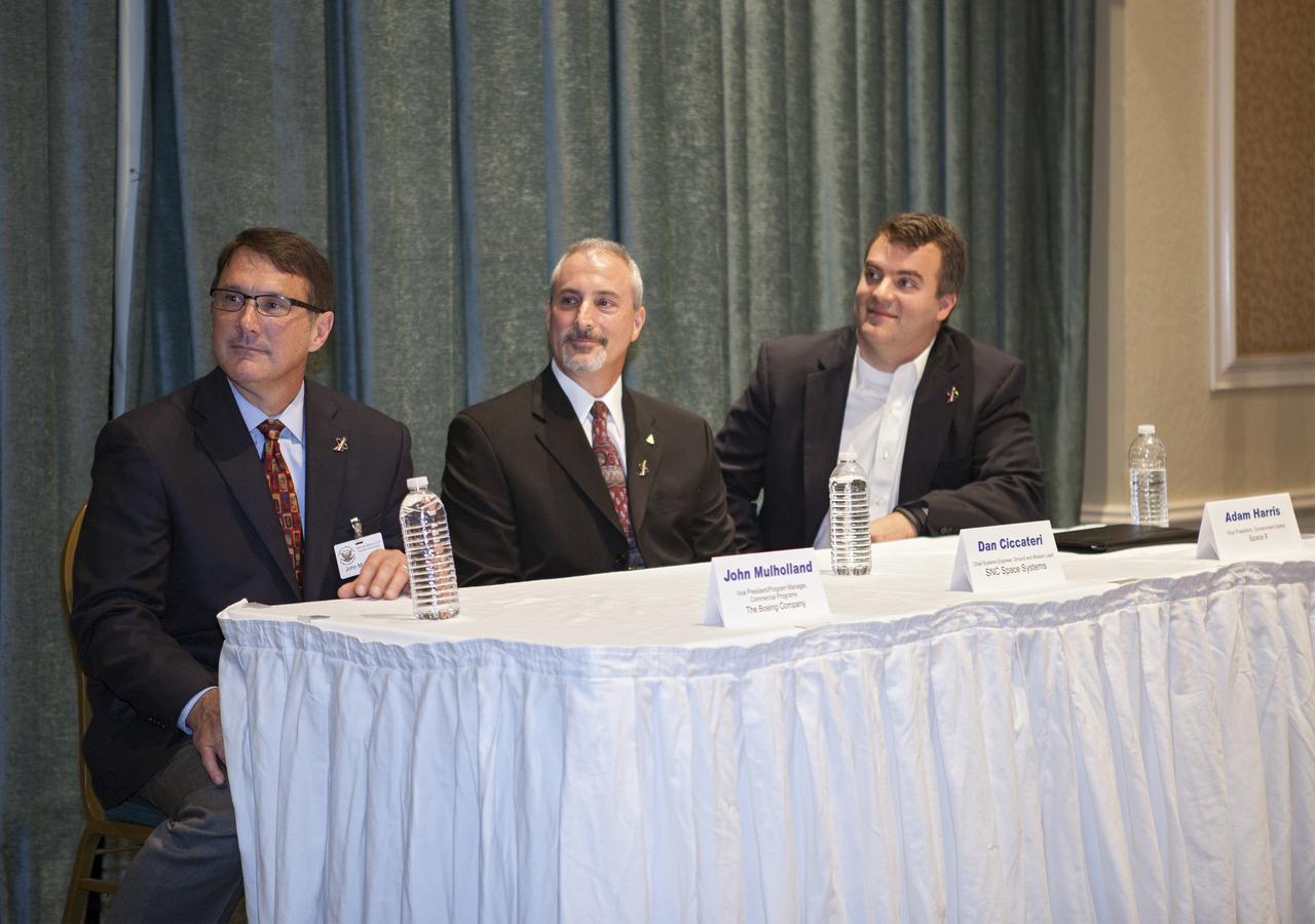 CAPE CANAVERAL, Fla. - NASA Commercial Crew Program, or CCP, partner representatives participate in the National Space Club Florida Committee's June meeting near the Kennedy Space Center. From left are The Boeing Company's vice president and program manager of Commercial Programs John Mulholland, Sierra Nevada Corporation, or SNC, Space Systems chief systems engineer Dan Ciccateri, and Space Exploration Technologies, or SpaceX, vice president of government sales Adam Harris. CCP Program Manager Ed Mango and the partners talked about plans to increase commercial activities on Florida’s space coast to send astronauts to low-Earth orbit.     To learn more about the Commercial Crew Program, visit www.nasa.gov/commercialcrew. Photo credit: Kim Shiflett