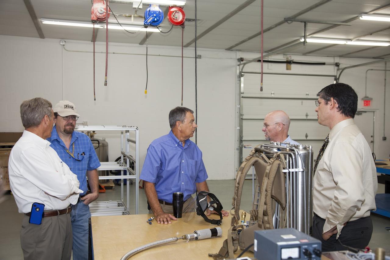 TITUSVILLE, Fla. - A small liquid-air filled backpack called CryoBA, short for Cryogenic Breathing Apparatus, is on display at BCS Life Support in Titusville, Fla. The CryoBA and a larger Cryogenic Refuge Alternative Supply System, or CryoRASS, are being developed by a NASA Kennedy Space Center engineering team in collaboration with The National Institute for Occupational Safety and Health to provide miners with twice the amount of breathable and cooler air than traditional compressed systems. The technology also could be used for commercial applications, such as fire and military rescue operations, as well as NASA's future human spaceflight missions. Photo credit: NASA/Daniel Casper
