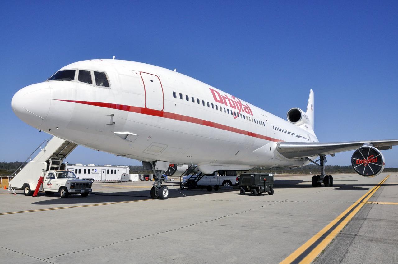 VANDENBERG ABF, Calif. - The Orbital Sciences L-1011 aircraft called "Stargazer" arrives at Vandenberg Air Force Base for the upcoming launch of the company's Pegasus XL rocket lifting NASA's IRIS solar observatory into orbit. The aircraft will carry the winged rocket to an altitude of 39,000 feet before releasing the Pegasus so its own motors can ignite to send the IRIS into space. The L-1011 is a modified airliner equipped to hold the Pegasus under its body safely. IRIS, short for Interface Region Imaging Spectrograph, is being prepared for launch from Vandenberg June 26. IRIS will open a new window of discovery by tracing the flow of energy and plasma through the chromospheres and transition region into the sun’s corona using spectrometry and imaging. IRIS fills a crucial gap in our ability to advance studies of the sun-to-Earth connection by tracing the flow of energy and plasma through the foundation of the corona and the region around the sun known as the heliosphere. Photo credit: VAFB/Randy Beaudoin