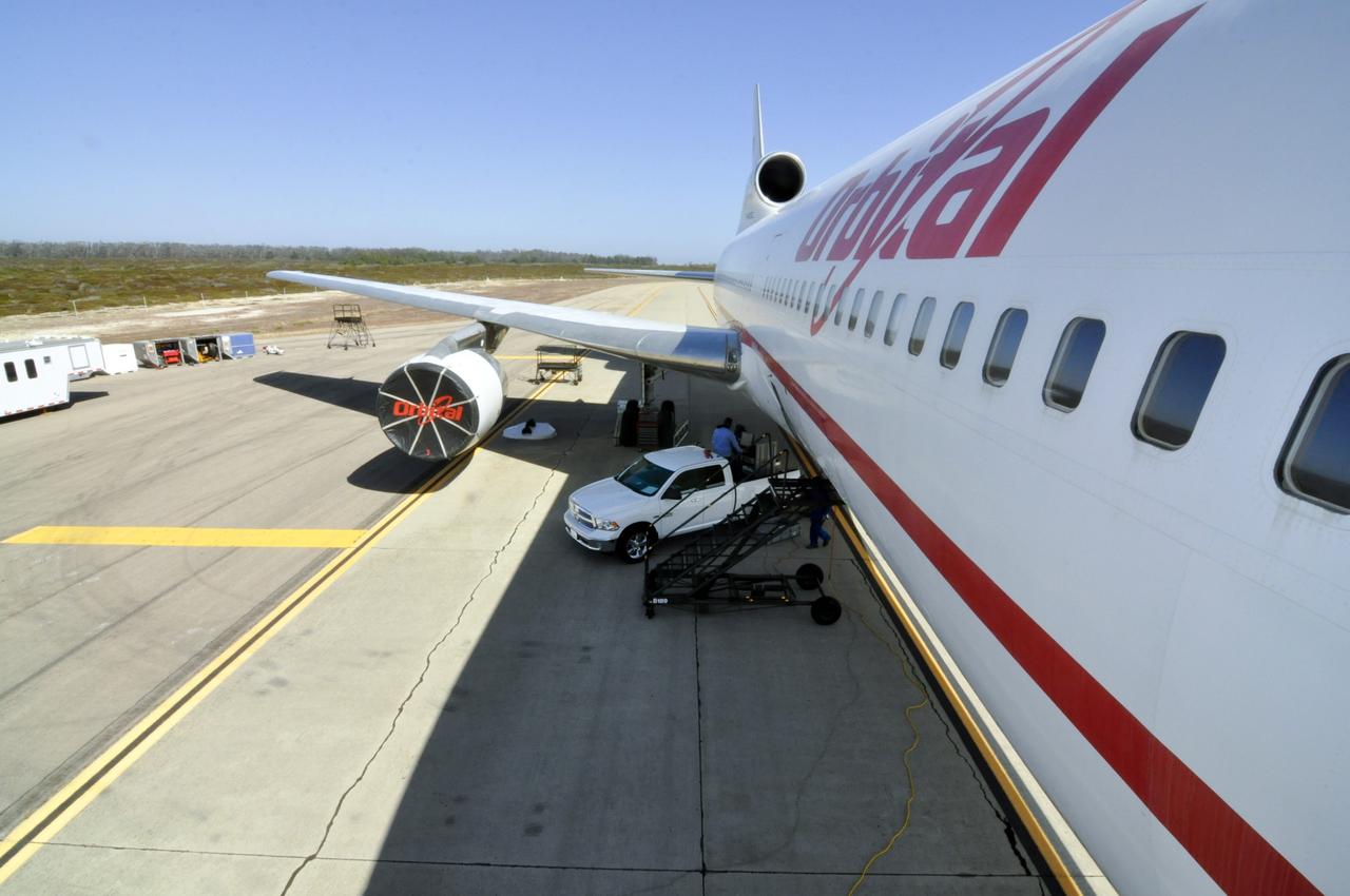 VANDENBERG ABF, Calif. - The Orbital Sciences L-1011 aircraft called "Stargazer" arrives at Vandenberg Air Force Base for the upcoming launch of the company's Pegasus XL rocket lifting NASA's IRIS solar observatory into orbit. The aircraft will carry the winged rocket to an altitude of 39,000 feet before releasing the Pegasus so its own motors can ignite to send the IRIS into space. The L-1011 is a modified airliner equipped to hold the Pegasus under its body safely. IRIS, short for Interface Region Imaging Spectrograph, is being prepared for launch from Vandenberg June 26. IRIS will open a new window of discovery by tracing the flow of energy and plasma through the chromospheres and transition region into the sun’s corona using spectrometry and imaging. IRIS fills a crucial gap in our ability to advance studies of the sun-to-Earth connection by tracing the flow of energy and plasma through the foundation of the corona and the region around the sun known as the heliosphere. Photo credit: VAFB/Randy Beaudoin