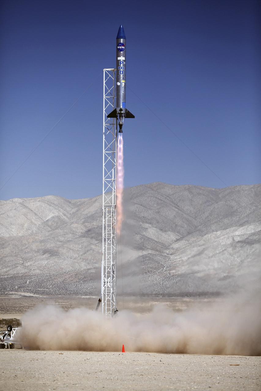 MOJAVE DESERT, Calif. – In the Mojave Desert in California, the Garvey Spacecraft Corporation's Prospector P-18D rocket lifts off at 10:52 a.m. PDT carrying the RUBICS-1 payload on a high-altitude, suborbital flight. The rocket carried four satellites made from four-inch cube sections. The rocket reached a peak altitude of about 9,000 feet, however the parachute deployed prematurely and the vehicle continued on its trajectory, coasting and tumbling to a hard landing on its side. In spite of the rough ride, all four CubeSats were recovered. PhoneSat and RUBICS received data in flight, but sustained structural damage. CP-9 and StangSat fared better, and their teams are working to recover as much information as possible. Collectively known as CubeSats, the satellites were designed to record shock, vibrations and heat inside the rocket. The results will be used to prove or strengthen their designs before they are carried into orbit in 2014 on a much larger rocket. Built by several different organizations, including a university, a NASA field center and a high school, the spacecraft are four-inch cubes designed to fly on their own eventually, but will remain firmly attached to the rocket during the upcoming mission. For more information, visit http://www.nasa.gov/mission_pages/smallsats/elana/cubesatlaunchpreview.html Photo credit: NASA/Dimitri Gerondidakis