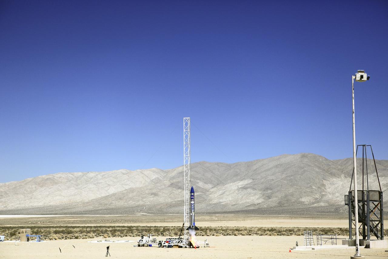 MOJAVE DESERT, Calif. – In the Mojave Desert in California, the Garvey Spacecraft Corporation's Prospector P-18D rocket lifts off at 10:52 a.m. PDT carrying the RUBICS-1 payload on a high-altitude, suborbital flight. The rocket carried four satellites made from four-inch cube sections. The rocket reached a peak altitude of about 9,000 feet, however the parachute deployed prematurely and the vehicle continued on its trajectory, coasting and tumbling to a hard landing on its side. In spite of the rough ride, all four CubeSats were recovered. PhoneSat and RUBICS received data in flight, but sustained structural damage. CP-9 and StangSat fared better, and their teams are working to recover as much information as possible. Collectively known as CubeSats, the satellites were designed to record shock, vibrations and heat inside the rocket. The results will be used to prove or strengthen their designs before they are carried into orbit in 2014 on a much larger rocket. Built by several different organizations, including a university, a NASA field center and a high school, the spacecraft are four-inch cubes designed to fly on their own eventually, but will remain firmly attached to the rocket during the upcoming mission. For more information, visit http://www.nasa.gov/mission_pages/smallsats/elana/cubesatlaunchpreview.html Photo credit: NASA/Dimitri Gerondidakis