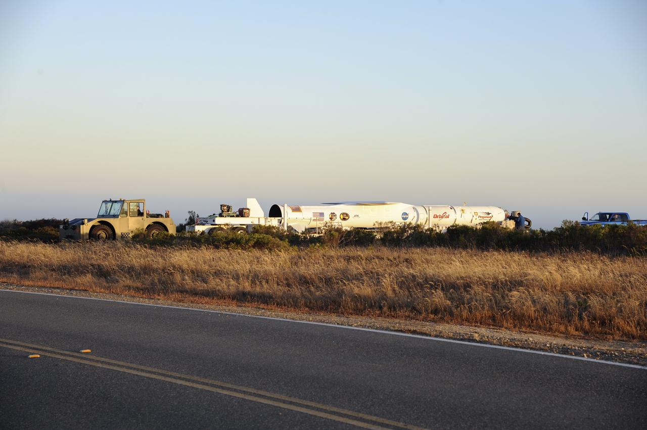 VANDENBERG AIR FORCE BASE, Calif. – At Vandenberg Air Force Base in California, the Pegasus XL rocket with the attached Interface Region Imaging Spectrograph IRIS solar observatory rolled out of the hangar on its transporter to the runway at Vandenberg. There, the rocket and spacecraft were mated with the Orbital Sciences L-1011 carrier aircraft.      Scheduled for launch from Vandenberg on June 26, 2013, IRIS will open a new window of discovery by tracing the flow of energy and plasma through the chromospheres and transition region into the sun’s corona using spectrometry and imaging. The IRIS mission will observe how solar material moves, gathers energy and heats up as it travels through a largely unexplored region of the solar atmosphere. The interface region, located between the sun's visible surface and upper atmosphere, is where most of the sun's ultraviolet emission is generated. These emissions impact the near-Earth space environment and Earth's climate.   For more information, visit http://www.nasa.gov/iris Photo credit: NASA/Randy Beaudoin