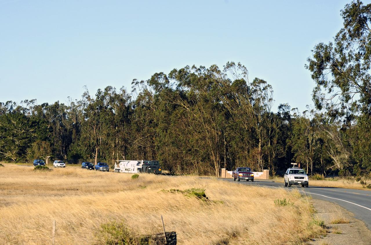 VANDENBERG AIR FORCE BASE, Calif. – At Vandenberg Air Force Base in California, the Pegasus XL rocket with the attached Interface Region Imaging Spectrograph IRIS solar observatory rolled out of the hangar on its transporter to the runway at Vandenberg. There, the rocket and spacecraft were mated with the Orbital Sciences L-1011 carrier aircraft.      Scheduled for launch from Vandenberg on June 26, 2013, IRIS will open a new window of discovery by tracing the flow of energy and plasma through the chromospheres and transition region into the sun’s corona using spectrometry and imaging. The IRIS mission will observe how solar material moves, gathers energy and heats up as it travels through a largely unexplored region of the solar atmosphere. The interface region, located between the sun's visible surface and upper atmosphere, is where most of the sun's ultraviolet emission is generated. These emissions impact the near-Earth space environment and Earth's climate.   For more information, visit http://www.nasa.gov/iris Photo credit: NASA/Randy Beaudoin