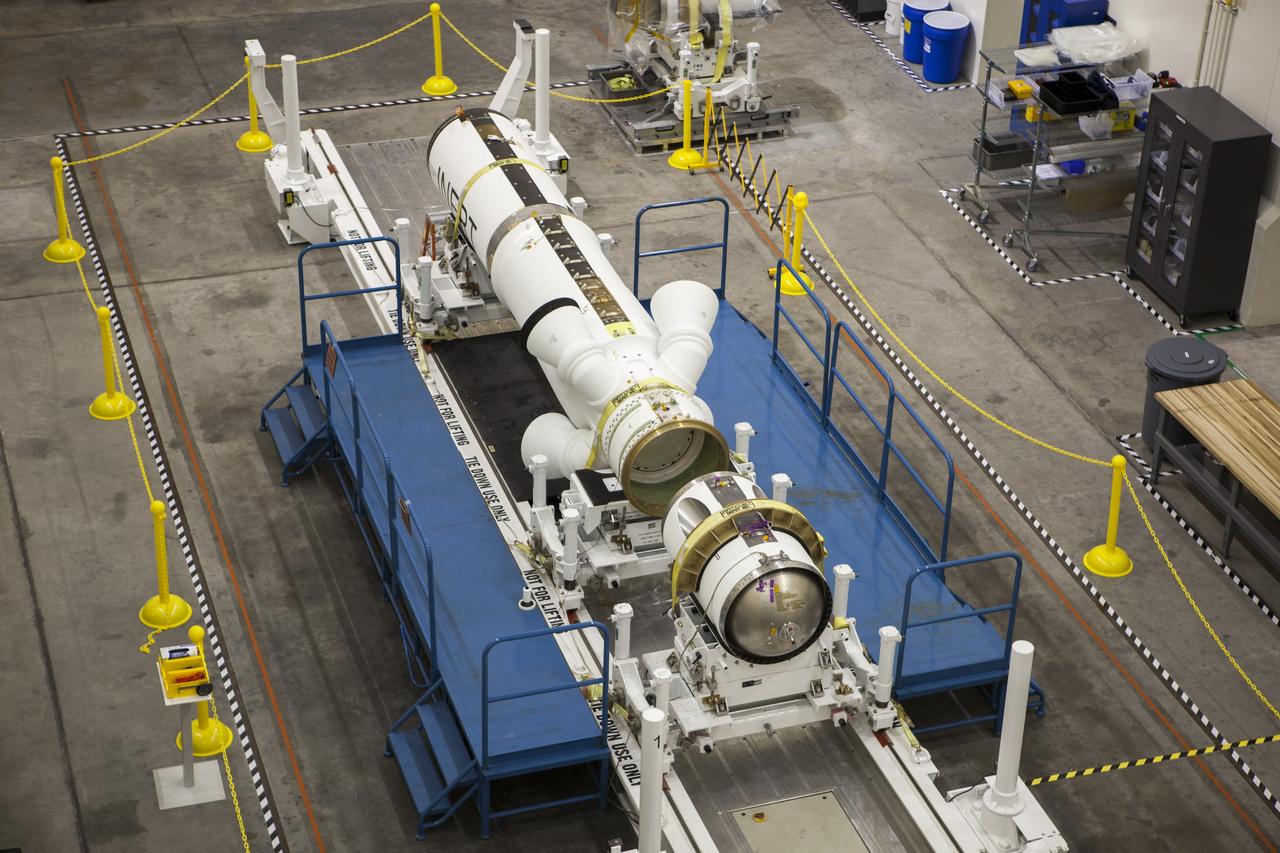 CAPE CANAVERAL, Fla. -- Inside the Launch Abort System Facility at NASA’s Kennedy Space Center in Florida, the launch abort motor has been prepared for connection to the attitude control motor. Both are segments of Orion’s Launch Abort System, which is designed to safely pull the Orion crew module away from the launch vehicle in the event of an emergency on the launch pad or during the initial ascent of NASA’s Space Launch System, or SLS, rocket. Orion is the exploration spacecraft designed to carry crews to space beyond low Earth orbit. It will provide emergency abort capability, sustain the crew during the space travel and provide safe re-entry from deep space return velocities. Orion’s first unpiloted test flight is scheduled to launch in 2014 atop a Delta IV rocket. A second uncrewed flight test is scheduled for 2017 on the SLS rocket. For more information, visit http://www.nasa.gov/orion. Photo credit: NASA/Dimitri Gerondidakis