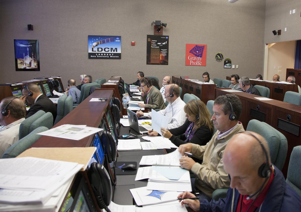 VANDENBERG AIR FORCE BASE, Calif. – At Vandenberg Air Force Base in California, mission managers participate in a pre-launch dress rehearsal in the Launch Vehicle Data Center for NASA’s Interface Region Imaging Spectrograph, or IRIS, solar observatory.    Scheduled for launch from Vandenberg on June 26 aboard an Orbital Sciences Pegasus XL rocket, IRIS will open a new window of discovery by tracing the flow of energy and plasma through the chromospheres and transition region in to the sun’s corona using spectrometry and imaging. The IRIS mission will observe how solar material moves, gathers energy and heats up as it travels through a largely unexplored region of the solar atmosphere. The interface region, located between the sun’s visible surface and upper atmosphere, is where most of the sun’s ultraviolet emission is generated. These emissions impact the near-Earth space environment and Earth’s climate. For more information, visit http://www.nasa.gov/iris.  Photo credit: NASA/Daniel Casper