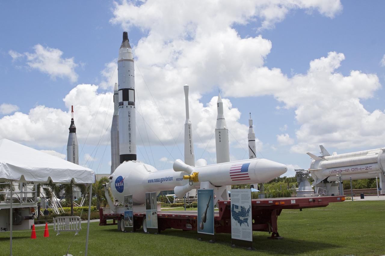 CAPE CANAVERAL, Fla. – At NASA’s Kennedy Space Center in Florida, a full-size mock-up of the Orion spacecraft and launch abort system are displayed at the Kennedy Space Center Visitor Complex. In the background is the rocket garden. Crane operators and technicians practice de-stacking operations on mock-ups of Orion and the launch abort system in the Vehicle Assembly Building in order to keep processing procedures and skills current. Orion is the exploration spacecraft designed to carry crews to space beyond low Earth orbit. It will provide emergency abort capability, sustain the crew during the space travel and provide safe re-entry from deep space return velocities. Orion’s first unpiloted test flight is scheduled to launch in 2014 atop a Delta IV rocket. A second uncrewed flight test is scheduled for 2017 on NASA’s Space Launch System rocket. For more information, visit http://www.nasa.gov/orion. Photo credit: NASA/Jim Grossmann