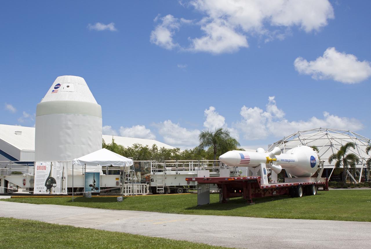 CAPE CANAVERAL, Fla. – At NASA’s Kennedy Space Center in Florida, a full-size mock-up of the Orion spacecraft and launch abort system are displayed at the Kennedy Space Center Visitor Complex. Crane operators and technicians practice de-stacking operations on mock-ups of Orion and the launch abort system in the Vehicle Assembly Building in order to keep processing procedures and skills current. Orion is the exploration spacecraft designed to carry crews to space beyond low Earth orbit. It will provide emergency abort capability, sustain the crew during the space travel and provide safe re-entry from deep space return velocities. Orion’s first unpiloted test flight is scheduled to launch in 2014 atop a Delta IV rocket. A second uncrewed flight test is scheduled for 2017 on NASA’s Space Launch System rocket. For more information, visit http://www.nasa.gov/orion. Photo credit: NASA/Jim Grossmann