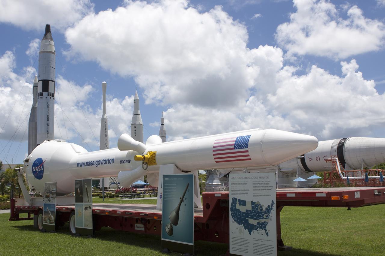 CAPE CANAVERAL, Fla. – At NASA’s Kennedy Space Center in Florida, a full-size mock-up of the launch abort system for Orion is displayed at the Kennedy Space Center Visitor Complex. In the background is the rocket garden. Crane operators and technicians practice de-stacking operations on mock-ups of Orion and the launch abort system in the Vehicle Assembly Building in order to keep processing procedures and skills current. Orion is the exploration spacecraft designed to carry crews to space beyond low Earth orbit. It will provide emergency abort capability, sustain the crew during the space travel and provide safe re-entry from deep space return velocities. Orion’s first unpiloted test flight is scheduled to launch in 2014 atop a Delta IV rocket. A second uncrewed flight test is scheduled for 2017 on NASA’s Space Launch System rocket. For more information, visit http://www.nasa.gov/orion. Photo credit: NASA/Jim Grossmann