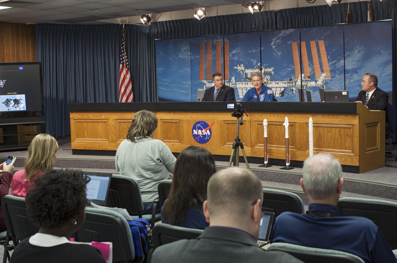 CAPE CANAVERAL, Fla. - NASA's Commercial Crew Program Manager Ed Mango and astronaut Mike Good media on the progress of American human spaceflight development at Kennedy Space Center in Florida. At right is NASA Public Affairs Officer Gregory Harland. They also discussed the future steps the program will take to certify crew transportation systems for missions to the International Space Station. The program is working toward the next phase of certification, which will be called Commercial Crew Transportation Capability, or CCtCap. That phase will include a joint test concept in which NASA astronauts will play a role in flight testing the systems.   To learn more about CCP, visit www.nasa.gov/commercialcrew. Photo credit: Jim Grossmann