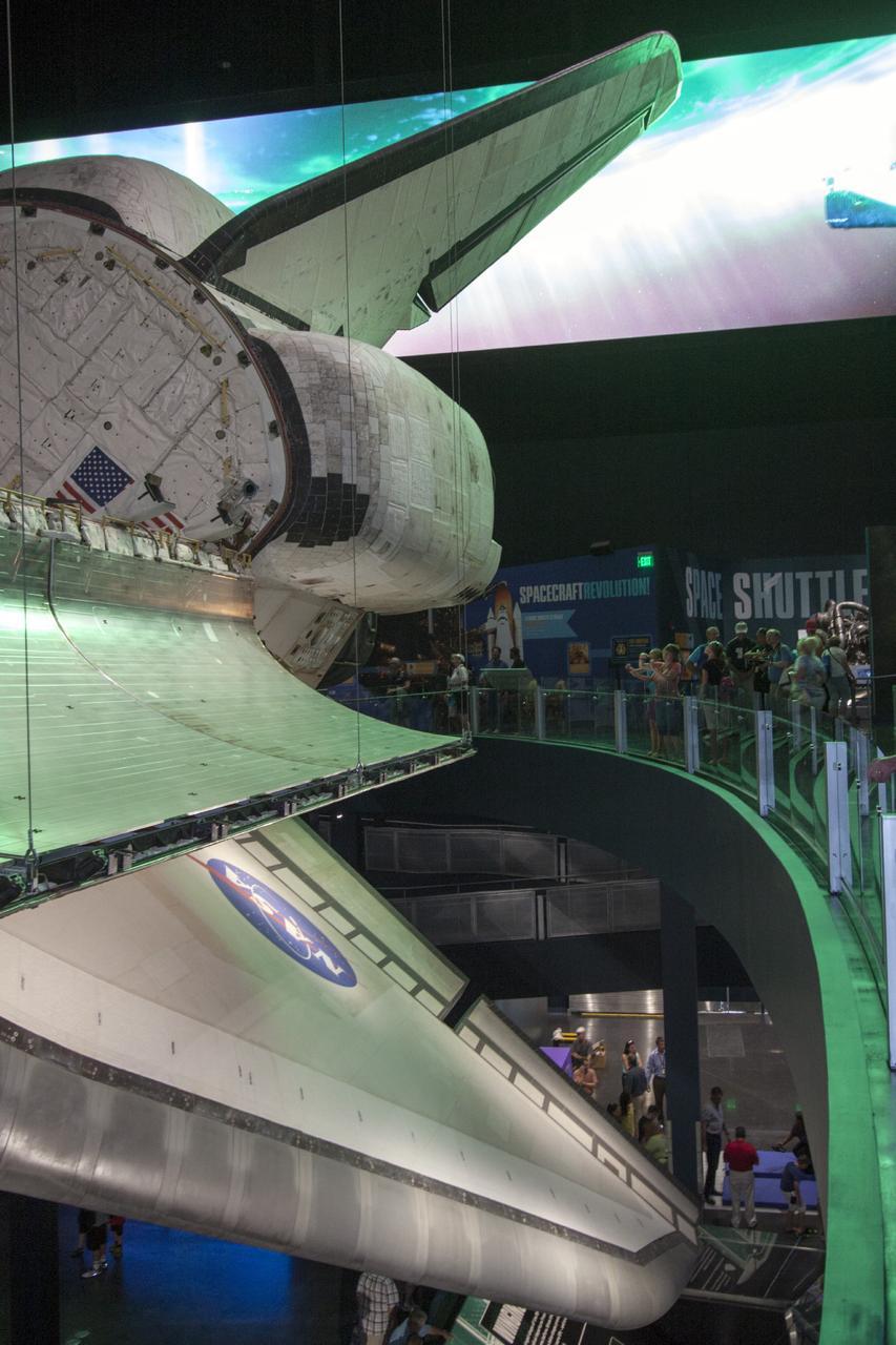 CAPE CANAVERAL, Fla. -- At the Kennedy Space Center Visitor Complex in Florida, guests participate in an early viewing of the Space Shuttle Atlantis and other exhibits inside the 90,000-square-foot facility. The new $100 million facility will include interactive exhibits that tell the story of the 30-year Space Shuttle Program and highlight the future of space exploration. The "Space Shuttle Atlantis" exhibit is scheduled to open June 29, 2013.Photo credit: NASA/Jim Grossmann