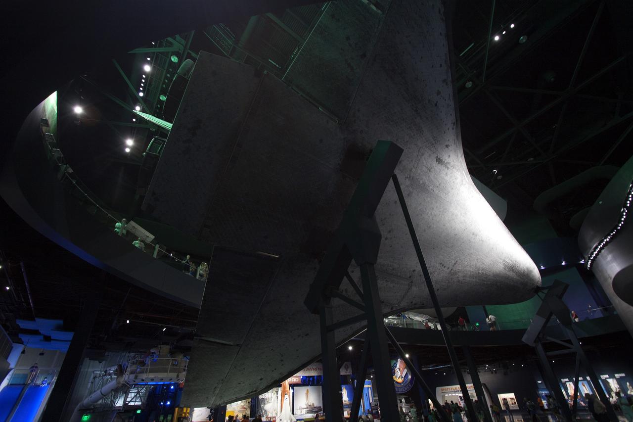 CAPE CANAVERAL, Fla. -- At the Kennedy Space Center Visitor Complex in Florida, guests participate in an early viewing of the Space Shuttle Atlantis and other exhibits inside the 90,000-square-foot facility. The new $100 million facility will include interactive exhibits that tell the story of the 30-year Space Shuttle Program and highlight the future of space exploration. The "Space Shuttle Atlantis" exhibit is scheduled to open June 29, 2013.Photo credit: NASA/Jim Grossmann