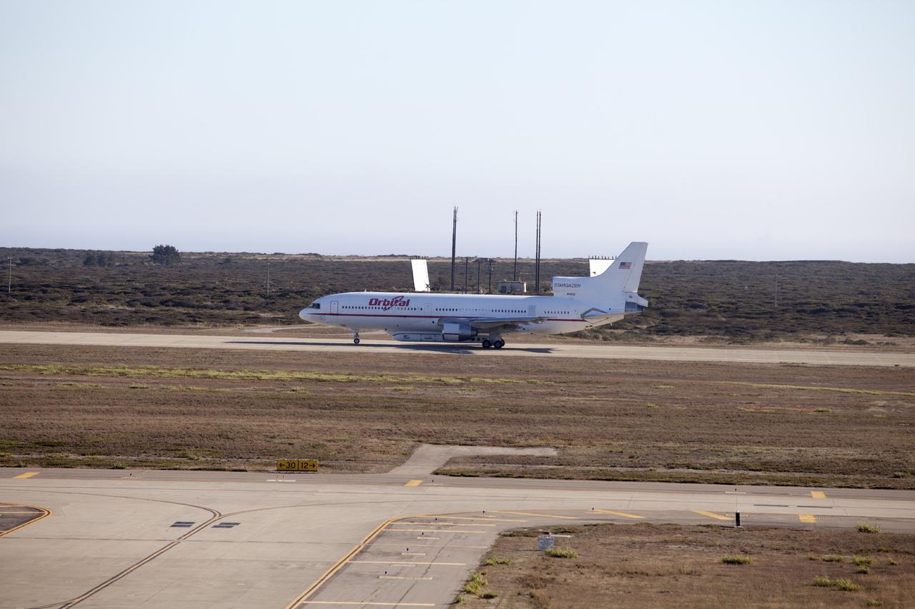 VANDENBERG AIR FORCE BASE, Calif. – An Orbital Sciences L-1011 carrier aircraft taxis to the runway at Vandenberg Air Force Base, Calif., before taking off on a mission to launch NASA's IRIS spacecraft into low-Earth orbit. IRIS, short for Interface Region Imaging Spectrograph, was launched aboard an Orbital Sciences Pegasus XL rocket released from the L-1011. Photo credit: NASA/Daniel Casper