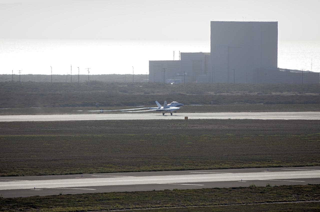 VANDENBERG AIR FORCE BASE, Calif. – A NASA F-18 takes off from Vandenberg Air Force Base, Calif., on a mission to record the launch of NASA's IRIS spacecraft into low-Earth orbit. IRIS, short for Interface Region Imaging Spectrograph, was launched aboard an Orbital Sciences Pegasus XL rocket released from an L-1011 carrier aircraft. Photo credit: NASA/Daniel Casper