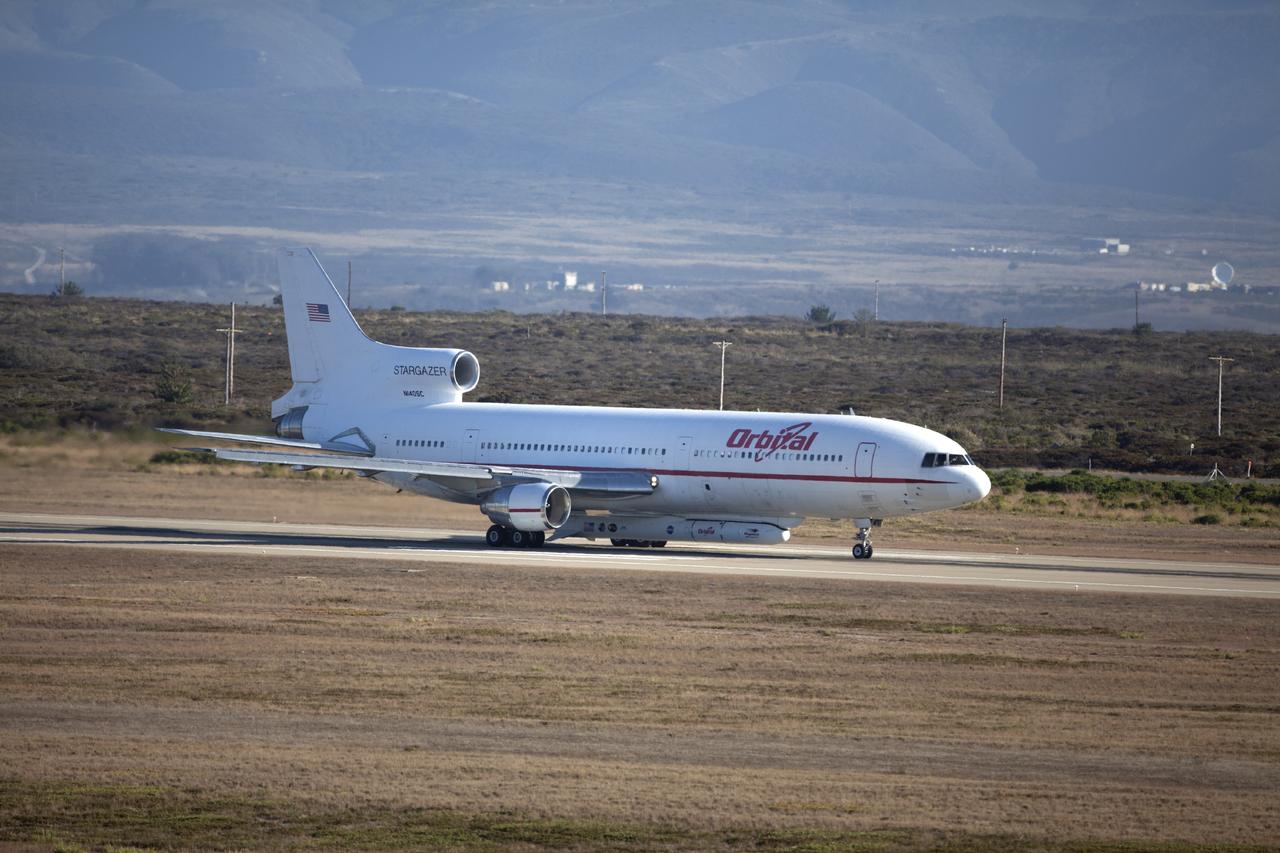 VANDENBERG AIR FORCE BASE, Calif. – An Orbital Sciences L-1011 carrier aircraft taxis to the runway at Vandenberg Air Force Base, Calif., before taking off on a mission to launch NASA's IRIS spacecraft into low-Earth orbit. IRIS, short for Interface Region Imaging Spectrograph, was launched aboard an Orbital Sciences Pegasus XL rocket released from the L-1011. Photo credit: NASA/Daniel Casper