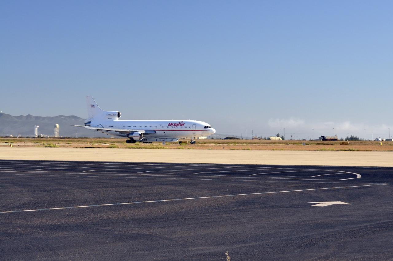 VANDENBERG AIR FORCE BASE, Calif. – An Orbital Sciences L-1011 carrier aircraft taxis to the runway at Vandenberg Air Force Base, Calif., before taking off on a mission to launch NASA's IRIS spacecraft into low-Earth orbit. IRIS, short for Interface Region Imaging Spectrograph, was launched aboard an Orbital Sciences Pegasus XL rocket released from the L-1011. Photo credit: VAFB/Randy Beaudoin