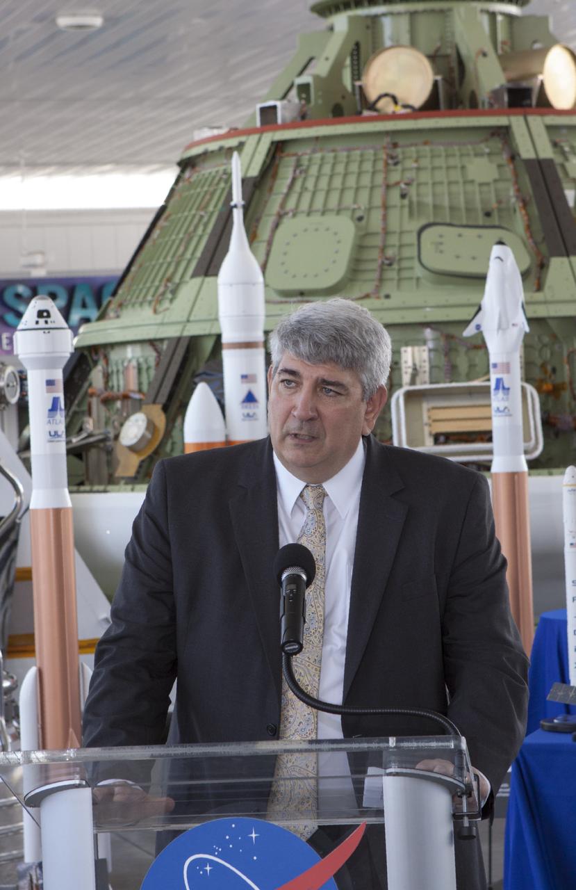 CAPE CANAVERAL, Fla. -- Space Florida Chief Operating Officer Jim Kuzma comments on the prospect of a new agency partnership during a news conference at the Kennedy Space Center Visitor Complex in Florida. NASA has selected Space Florida, the aerospace economic development agency for the state of Florida, for negotiations toward a partnership agreement to maintain and operate the historic Shuttle Landing Facility, or SLF. NASA issued a request for information to industry in 2012 to identify new and innovative ways to use the facility for current and future commercial and government mission activities. Space Florida's proposal is aligned closely with Kennedy's vision for creating a multiuser spaceport. The SLF, specially designed for space shuttles returning to Kennedy, opened for flights in 1976. The concrete runway is 15,000 feet long and 300 feet wide. The SLF is capable of handling all types and sizes of aircraft and horizontal launch and landing vehicles. For more information on Space Florida, visit http://www.spaceflorida.gov. Photo credit: NASA/Jim Grossmann