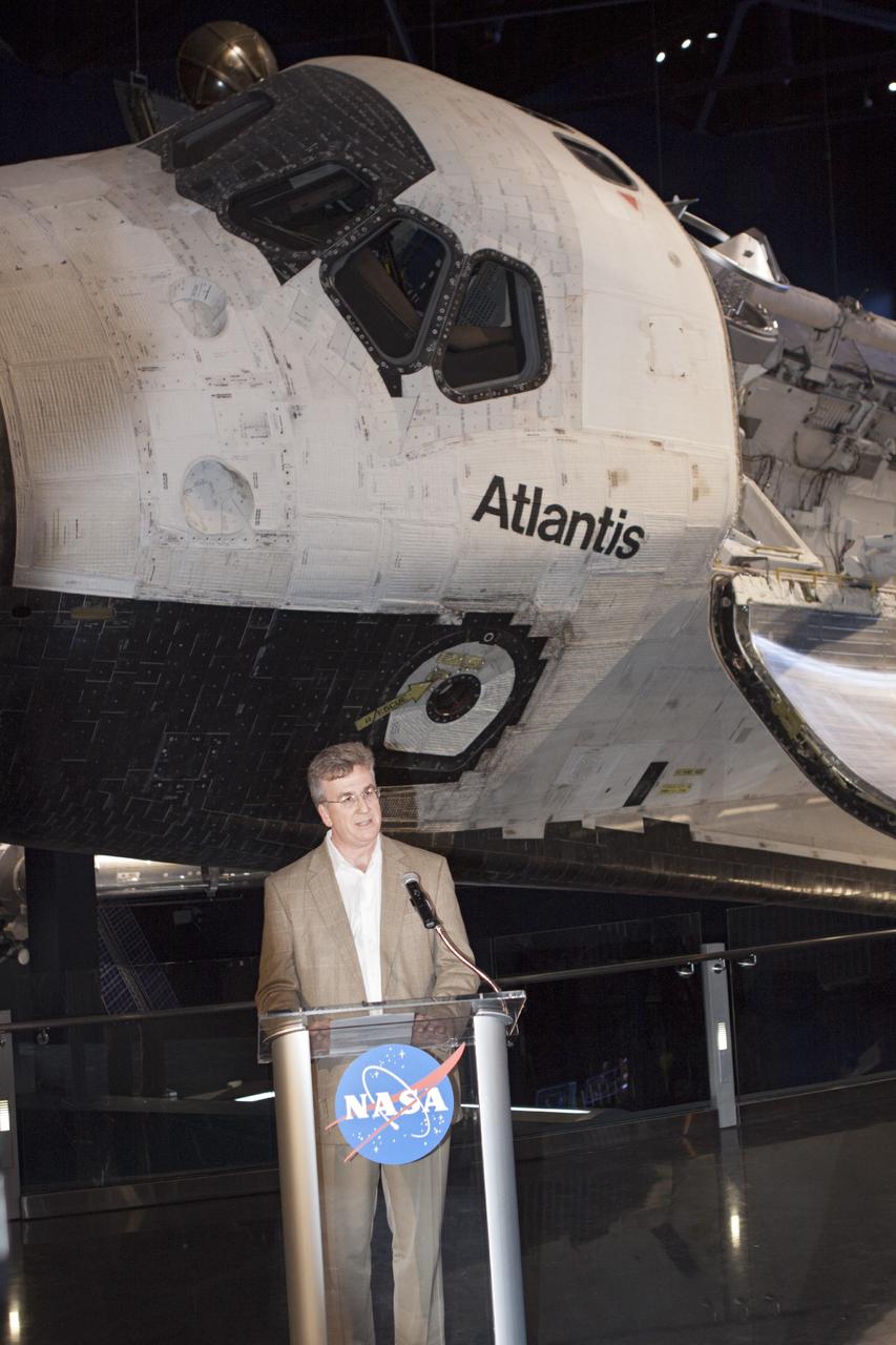 CAPE CANAVERAL, Fla. -- At the Kennedy Space Center Visitor Complex in Florida, Mike Konzen of PGAV Destinations speaks to news media representatives during the opening of the 90,000-square-foot "Space Shuttle Atlantis" facility. PGAV was responsible for the "Space Shuttle Atlantis" facility design and architecture.      The new $100 million facility includes interactive exhibits that tell the story of the 30-year Space Shuttle Program and highlight the future of space exploration. The "Space Shuttle Atlantis" exhibit formally opened to the public on June 29, 2013.Photo credit: NASA/Jim Grossmann