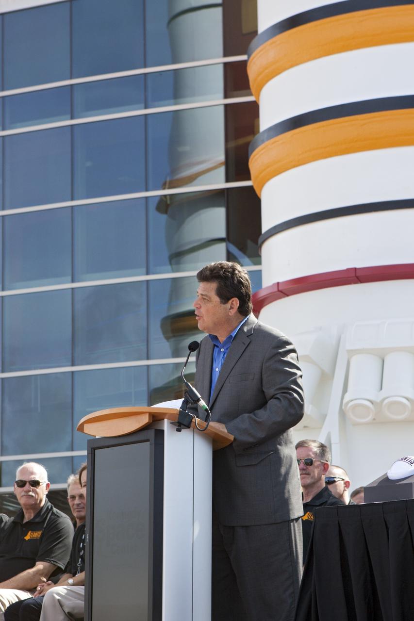 CAPE CANAVERAL, Fla. -- At the Kennedy Space Center Visitor Complex in Florida, CNN correspondent John Zarrella speaks to guests at the opening of the new "Space Shuttle Atlantis" facility. Zarrella served as master of ceremonies for the event.      The new $100 million facility includes interactive exhibits that tell the story of the 30-year Space Shuttle Program and highlight the future of space exploration. The "Space Shuttle Atlantis" exhibit formally opened to the public on June 29, 2013.Photo credit: NASA/Jim Grossmann