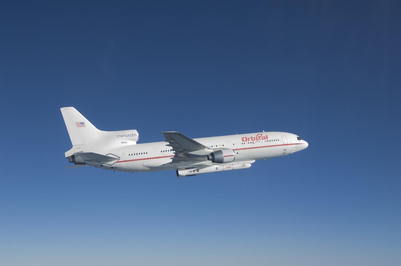 VANDENBERG AFB, Calif. – An Orbital Sciences L-1011 carrier aircraft flies over the Pacific Ocean off the California coast on a mission to launch NASA's IRIS spacecraft into low-Earth orbit. IRIS, short for Interface Region Imaging Spectrograph, was launched aboard an Orbital Sciences Pegasus XL rocket released from the bottom of the L-1011.Photo credit: NASA/Lori Losey