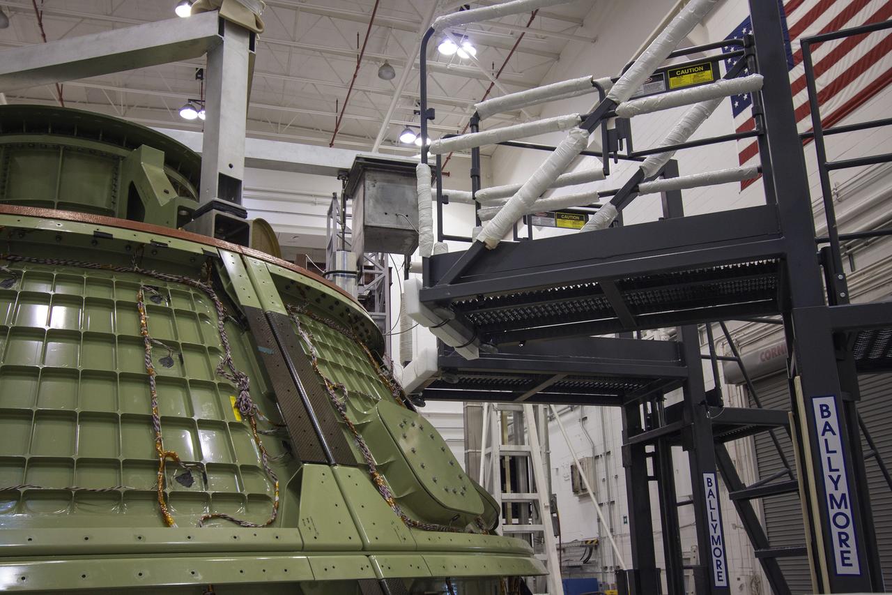 CAPE CANAVERAL, Fla. -- Inside the Launch Equipment Test Facility at NASA’s Kennedy Space in Florida, a second firing of the escape hold down post has occurred during a pyrotechnic bolt test on the Orion ground test vehicle.      Lockheed Martin performed tests over a series of days on the explosive bolts that separate Orion from the launch abort system. Data was collected on the effect of shock waves on Orion during the explosive bolt separation. Orion is the exploration spacecraft designed to carry crews to space beyond low Earth orbit. It will provide emergency abort capability, sustain the crew during the space travel and provide safe re-entry from deep space return velocities. The first unpiloted test flight of the Orion is scheduled to launch in 2014 atop a Delta IV rocket and in 2017 on a Space Launch System rocket. For more information, visit http://www.nasa.gov/orion. Photo credit: NASA/Jim Grossmann