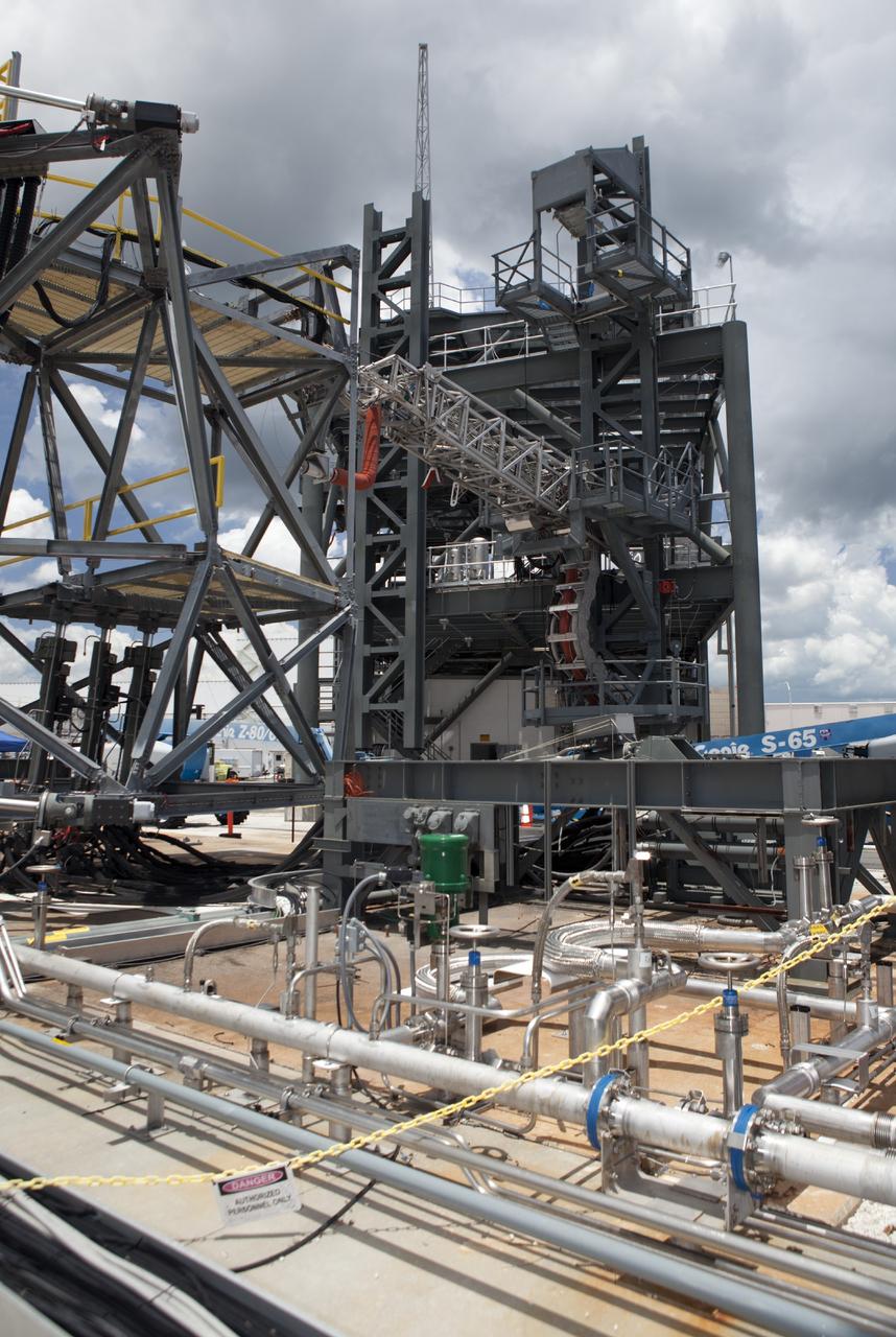 CAPE CANAVERAL, Fla. -- The quick disconnect for a modified instrument unit and liquid hydrogen tilt up umbilical is being tested at the Launch Equipment Test Facility by engineers in the Ground Systems Development and Operations Program at NASA’s Kennedy Space Center in Florida. The umbilical will be partially reutilized for the Orion Service Module Unit.    Orion is the exploration spacecraft designed to carry crews to space beyond low Earth orbit. It will provide emergency abort capability, sustain the crew during the space travel and provide safe re-entry from deep space return velocities. The first unpiloted test flight of the Orion is scheduled to launch in 2014 atop a Delta IV rocket and in 2017 on a Space Launch System rocket. For more information, visit http://www.nasa.gov/orion. Photo credit: NASA/Dimitri Gerondidakis