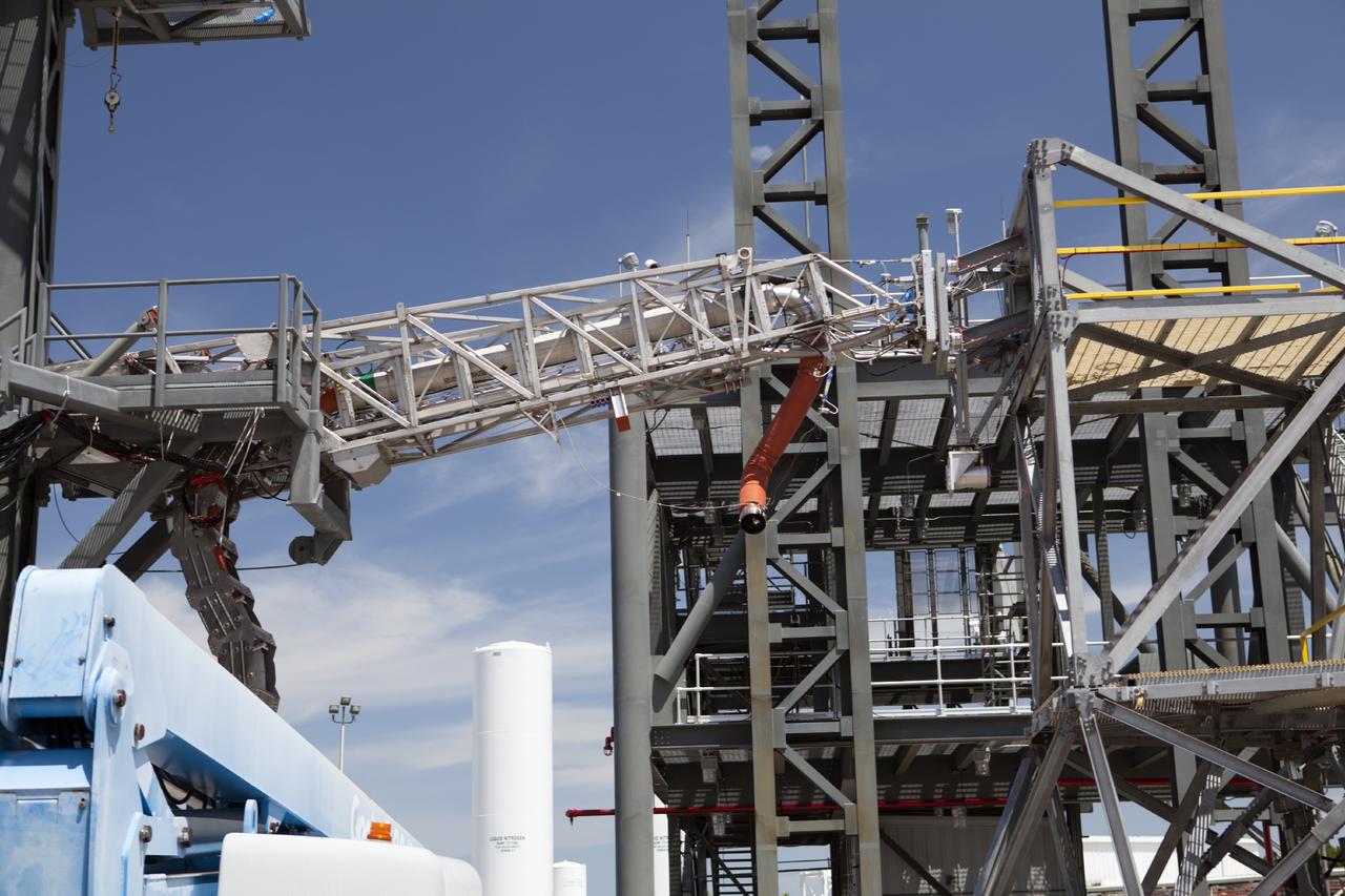 CAPE CANAVERAL, Fla. -- The quick disconnect for a modified instrument unit and liquid hydrogen tilt up umbilical is being tested at the Launch Equipment Test Facility by engineers in the Ground Systems Development and Operations Program at NASA’s Kennedy Space Center in Florida. The umbilical will be partially reutilized for the Orion Service Module Unit.    Orion is the exploration spacecraft designed to carry crews to space beyond low Earth orbit. It will provide emergency abort capability, sustain the crew during the space travel and provide safe re-entry from deep space return velocities. The first unpiloted test flight of the Orion is scheduled to launch in 2014 atop a Delta IV rocket and in 2017 on a Space Launch System rocket. For more information, visit http://www.nasa.gov/orion. Photo credit: NASA/Dimitri Gerondidakis