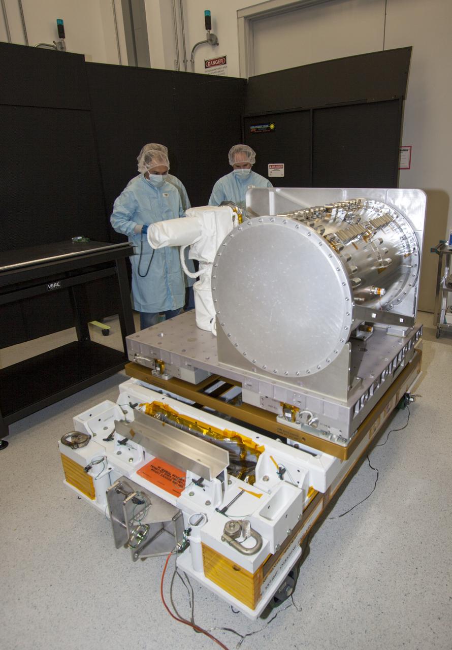 CAPE CANAVERAL, Fla. -- At NASA’s Kennedy Space Center in Florida, the Optical Payload for Lasercomm Science, or OPALS, experiment has been uncovered in a test cell at a Space Station Processing Facility offline laboratory. The optical technology demonstration experiment arrived from the agency’s Jet Propulsion Laboratory in Pasadena, Calif. NASA will use the International Space Station to test OPALS’ communications technology that could dramatically improve spacecraft communications, enhance commercial missions and strengthen transmission of scientific data. The experiment is slated to fly later this year aboard a SpaceX Dragon commercial resupply mission to the space station. The mission is expected to run 90 days after installation on the outside of the station. For more information about OPALS, visit: http://go.nasa.gov/10MMPDO. Photo credit: NASA/Jim Grossmann