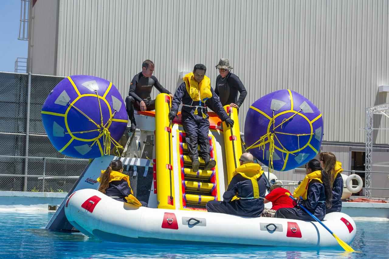 LAS VEGAS, Nev. – The Boeing Company performed simulated contingency water landing scenarios with a mock-up CST-100 spacecraft at Bigelow Aerospace's headquarters near Las Vegas. The CST-100 is designed for ground landings, but could splash down on the water, if necessary. During the water tests, Department of Defense search-and-recovery personnel practiced pulling five Boeing engineers out of the capsule and to safety.    The tests are part of the company’s ongoing work supporting its funded Space Act Agreement with NASA’s Commercial Crew Program, or CCP, during the Commercial Crew Integrated Capability, or CCiCap, initiative. CCP is intended to lead to the availability of commercial human spaceflight services for government and commercial customers to low-Earth orbit. Future development and certification initiatives eventually will lead to the availability of human spaceflight services for NASA to send its astronauts to the International Space Station, where critical research is taking place daily. For more information about CCP, go to http://www.nasa.gov/commercialcrew. Photo credit: Boeing