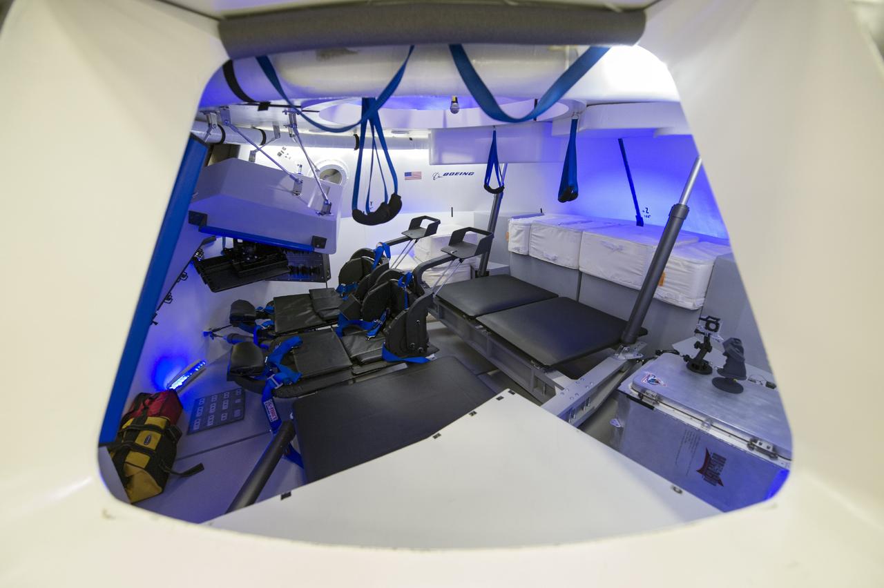 HOUSTON - The Boeing Company unveils its fully outfitted CST-100 mock-up at the company's Houston Product Support Center in Texas. This test version is optimized to support five crew members and will allow the company to evaluate crew safety, interfaces, communications, maneuverability and ergonomics. Boeing's CST-100 is designed being to transport crew members or a mix of crew and cargo to low-Earth-orbit destinations, including the International Space Station. Boeing is one of three aerospace industry partners working with CCP during its Commercial Crew Integrated Capability, or CCiCap, initiative, which is intended to make commercial human spaceflight services available for government and commercial customers. To learn more about CCP, visit www.nasa.gov/commercialcrew. Photo credit: NASA/Robert Markowitz