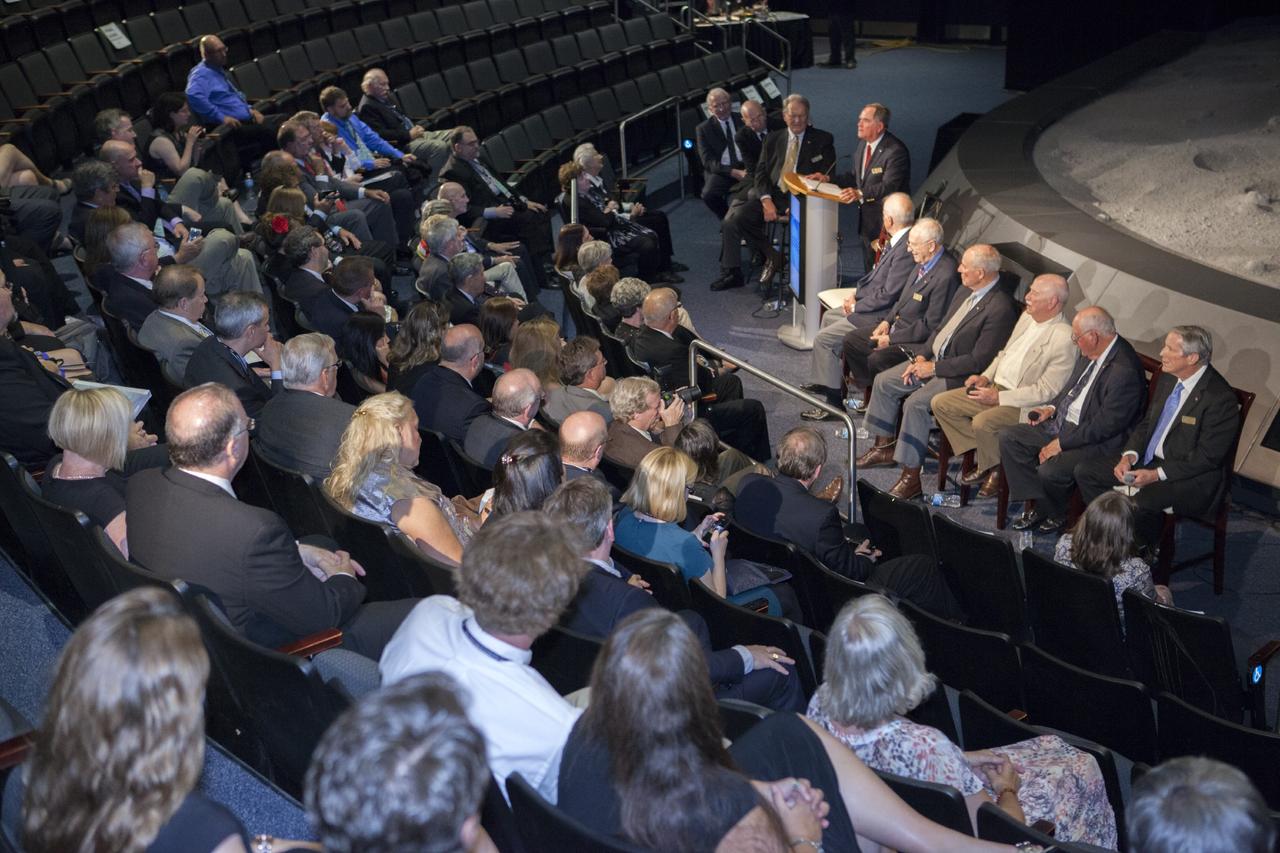 CAPE CANAVERAL, Fla. – Astronaut Scholarship Foundation guests at the Kennedy Space Center's Apollo/Saturn V Center listen as Skylab era astronauts celebrate the 40th anniversary of Skylab.       The gala commemorating the 40th anniversary of Skylab included six of the nine astronauts who flew missions to America's first space station. The orbiting laboratory was launched unpiloted from Kennedy on May 14, 1973. Between May 25, 1973 and Feb. 8, 1974, crews of three spent 28, 59 and 84 days living and working in low-Earth orbit aboard the station. For more information, visit http://www.nasa.gov/mission_pages/skylab/ Photo credit: NASA/Kim Shiflett