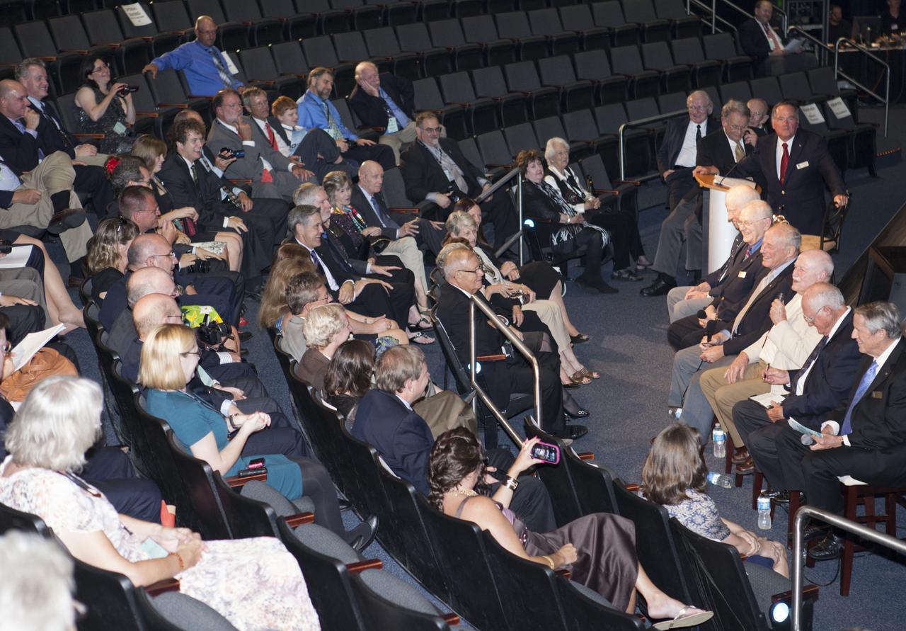 CAPE CANAVERAL, Fla. – Astronaut Scholarship Foundation guests at the Kennedy Space Center's Apollo/Saturn V Center listen as Skylab era astronauts celebrate the 40th anniversary of Skylab.      The gala commemorating the 40th anniversary of Skylab included six of the nine astronauts who flew missions to America's first space station. The orbiting laboratory was launched unpiloted from Kennedy on May 14, 1973. Between May 25, 1973 and Feb. 8, 1974, crews of three spent 28, 59 and 84 days living and working in low-Earth orbit aboard the station. For more information, visit http://www.nasa.gov/mission_pages/skylab/ Photo credit: NASA/Kim Shiflett