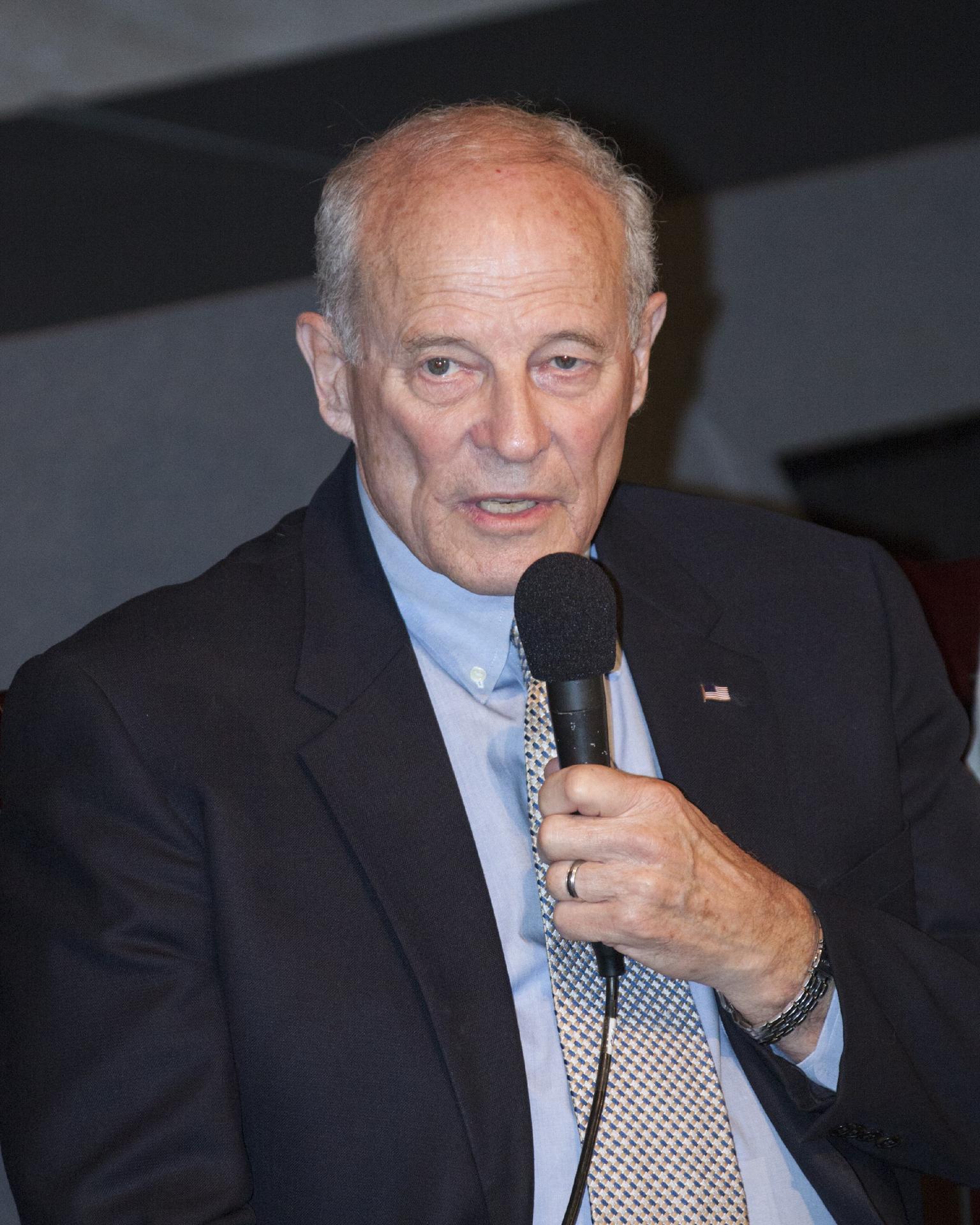 Jack Lousma speaks into a microphone