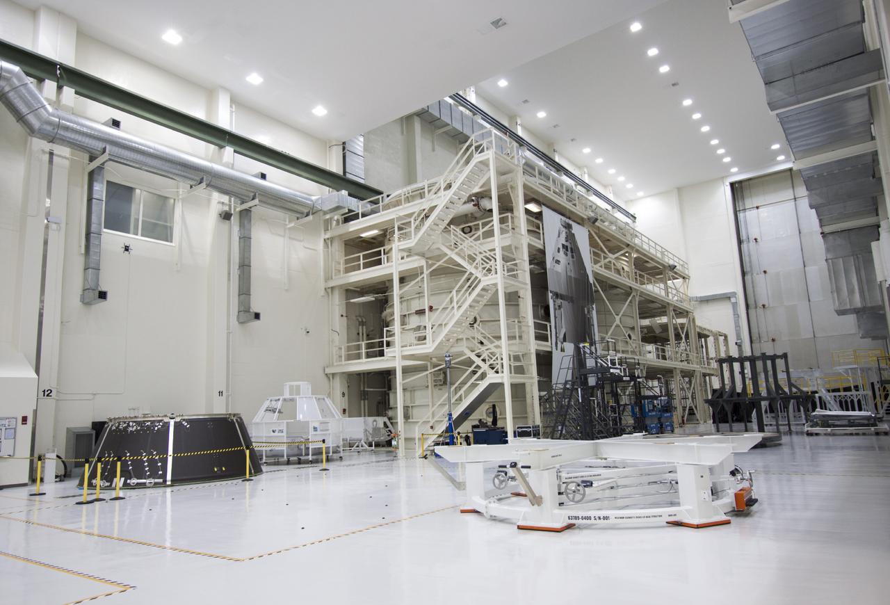 CAPE CANAVERAL, Fla. – Inside the Operations and Checkout Building high bay at NASA’s Kennedy Space Center in Florida, the Orion service module spacecraft adapter cone for Exploration Flight Test 1 has arrived for checkout and processing. Tooling and test fixtures have been attached to the cone.      Orion is the exploration spacecraft designed to carry crews to space beyond low Earth orbit. It will provide emergency abort capability, sustain the crew during the space travel and provide safe re-entry from deep space return velocities. The first unpiloted test flight of the Orion is scheduled to launch in 2014 atop a Delta IV rocket and in 2017 on a Space Launch System rocket. For more information, visit http://www.nasa.gov/orion. Photo credit: NASA/Jim Grossmann