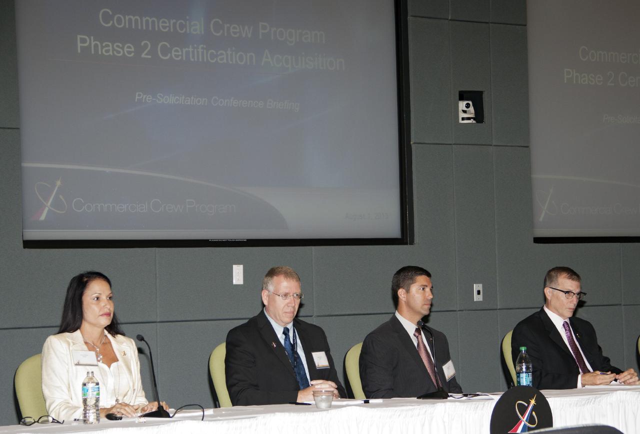 CAPE CANAVERAL, Fla. - Panelists of the Commercial Crew Transportation Capability, or CCtCap, Pre-Proposal Conference at Kennedy Space Center in Florida are, from left, Maria Collura, Brian Hinerth, Trip Healy and Lee Pagel. CCtCap will be the next phase of certification efforts for CCP mission to the International Space Station. The purpose of the conference was to involve aerospace industry representatives in the CCtCap draft Request for Proposal, or RFP, process and provide a greater understanding for both parties before the official RFP is released in the fall of 2013.      To learn more about CCP, visit www.nasa.gov/commercialcrew. Photo credit: NASA/Jim Grossmann
