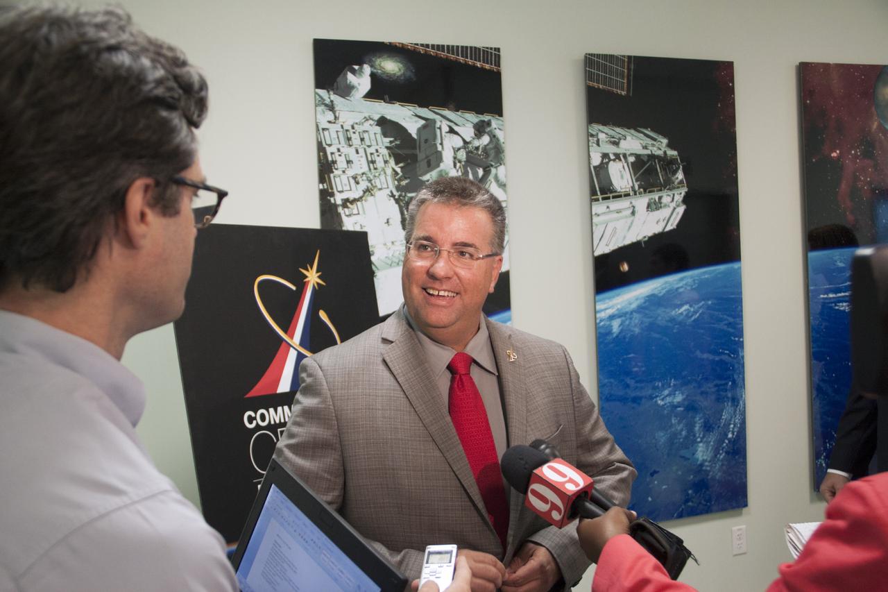 CAPE CANAVERAL, Fla. - Ed Mango, manager of NASA's Commercial Crew Program, or CCP, talks to media following the Commercial Crew Transportation Capability, or CCtCap, Pre-Proposal Conference at Kennedy Space Center in Florida. CCtCap will be the next phase of certification efforts for CCP mission to the International Space Station. The purpose of the conference was to involve aerospace industry representatives in the CCtCap draft Request for Proposal, or RFP, process and provide a greater understanding for both parties before the official RFP is released in the fall of 2013. To learn more about CCP, visit www.nasa.gov/commercialcrew. Photo credit: NASA/Jim Grossmann