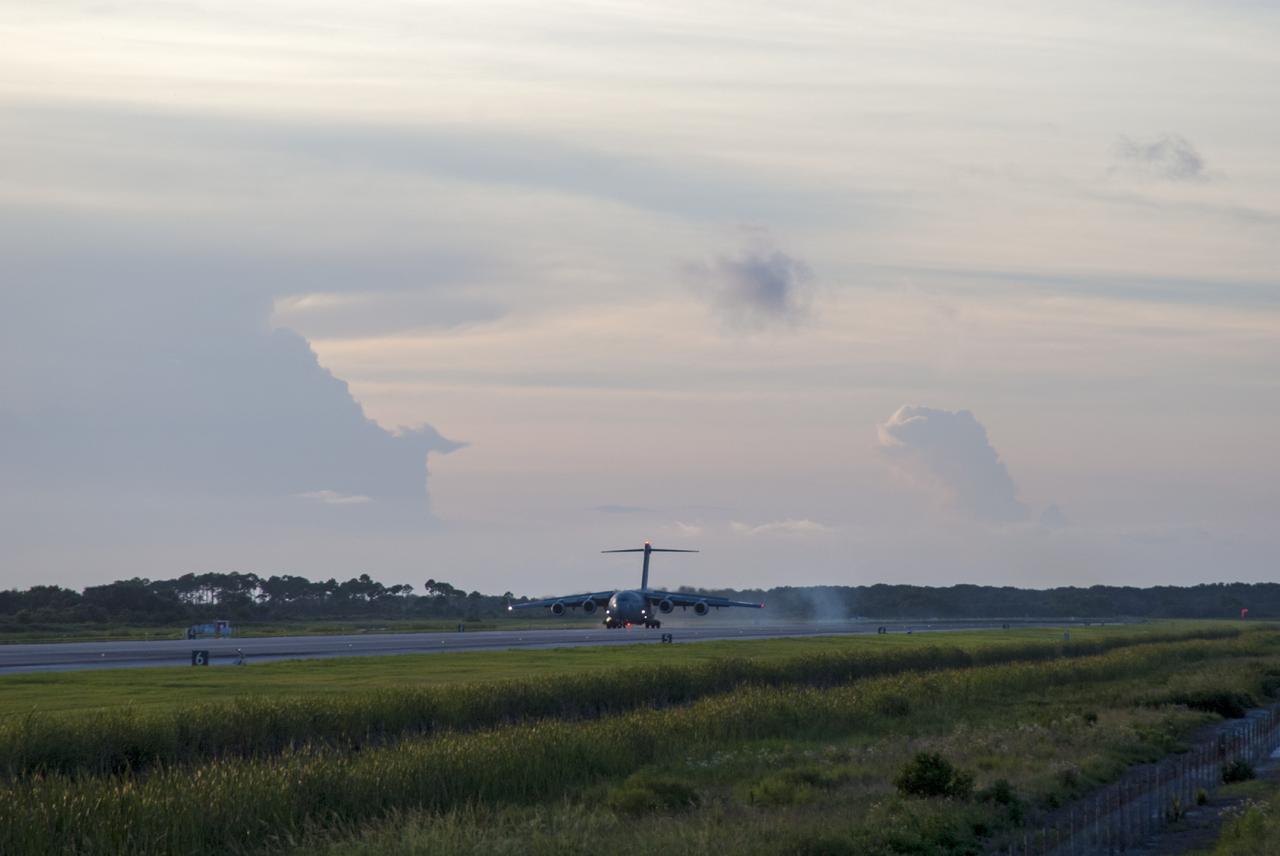 CAPE CANAVERAL, Fla. – A C-17 aircraft touches down at the Shuttle Landing Facility at NASA's Kennedy Space Center in Florida carrying the MAVEN spacecraft for processing ahead of a launch later this year on a United Launch Alliance Atlas V rocket. MAVEN, short for Mars Atmosphere and Volatile Evolution, will orbit Mars to study the Red Planet's upper atmosphere in unprecedented detail. Photo credit: NASA/Tim Jacobs