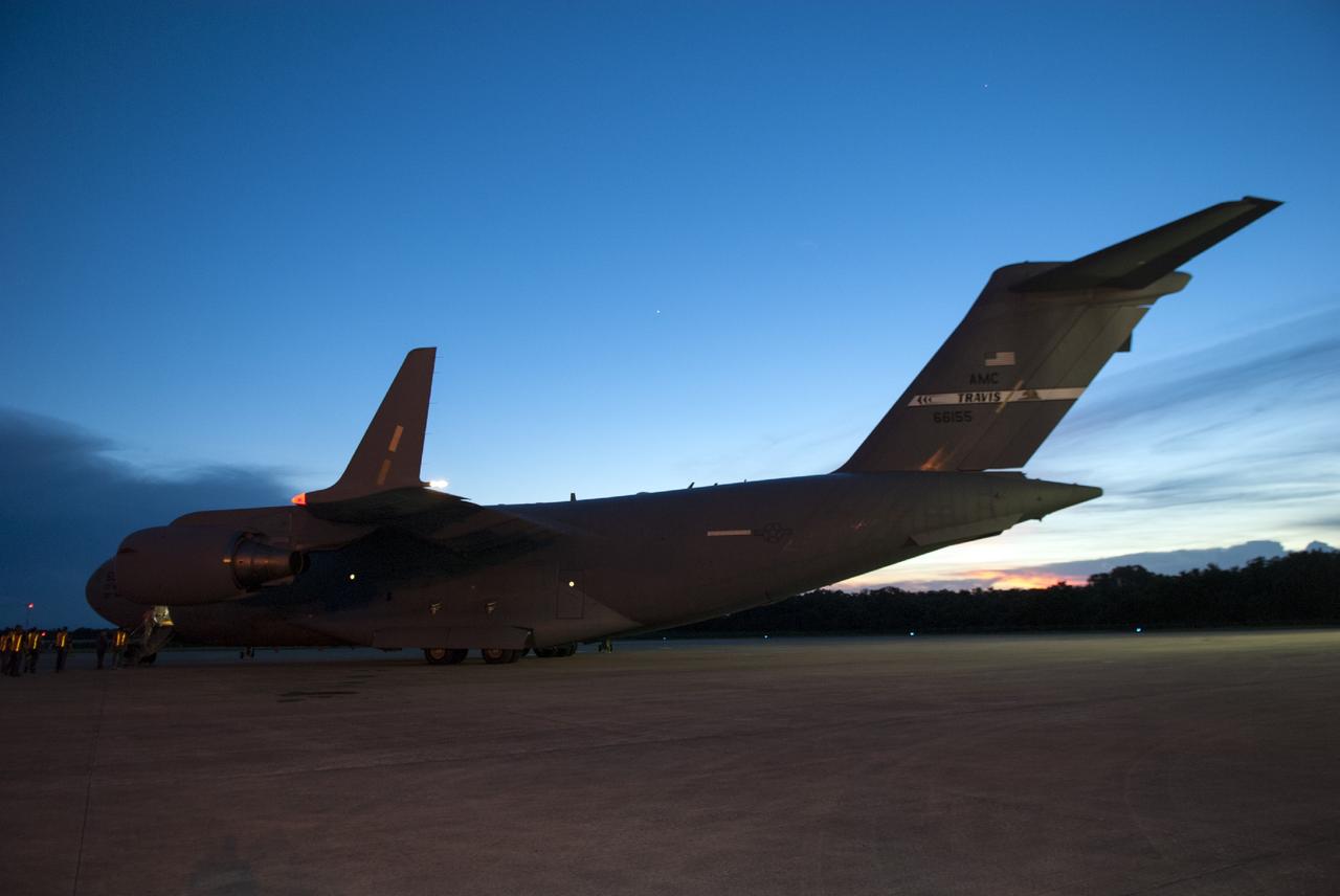CAPE CANAVERAL, Fla. – A C-17 aircraft carrying the MAVEN spacecraft has arrived at the Shuttle Landing Facility at NASA's Kennedy Space Center in Florida. The aircraft is delivering MAVEN for processing ahead of a launch later this year on a United Launch Alliance Atlas V rocket. MAVEN, short for Mars Atmosphere and Volatile Evolution, will orbit Mars to study the Red Planet's upper atmosphere in unprecedented detail. Photo credit: NASA/Tim Jacobs