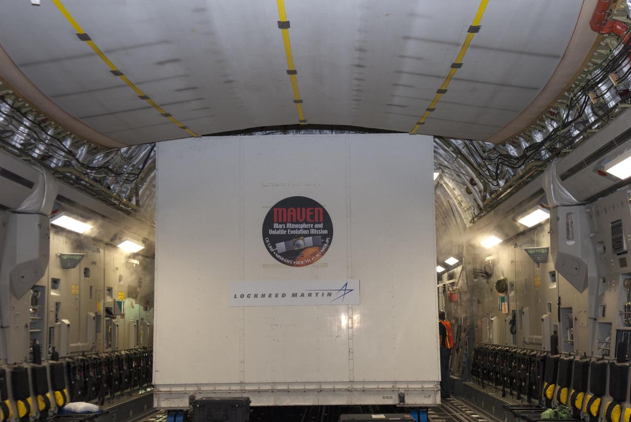 CAPE CANAVERAL, Fla. – Still in its shipping container, the MAVEN spacecraft awaits offload from a C-17 aircraft following its arrival at NASA's Kennedy Space Center in Florida. The aircraft is delivering MAVEN for processing ahead of a launch later this year on a United Launch Alliance Atlas V rocket. MAVEN, short for Mars Atmosphere and Volatile Evolution, will orbit Mars to study the Red Planet's upper atmosphere in unprecedented detail. Photo credit: NASA/Tim Jacobs
