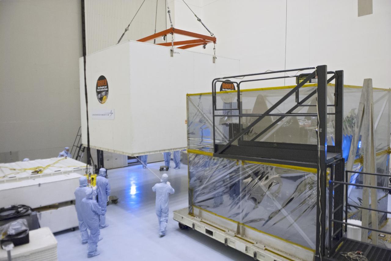 CAPE CANAVERAL, Fla. – Engineers move a shipping container from around NASA’s Mars Atmosphere and Volatile Evolution MAVEN spacecraft inside the Payload Hazardous Servicing Facility on Aug. 3, 2013, at the agency’s Kennedy Space Center in Florida. MAVEN will be prepared inside the facility for its scheduled November launch to Mars. Positioned in an orbit above the Red Planet, MAVEN will study the upper atmosphere of Mars in unprecedented detail. Photo credit: NASA/Tim Jacobs