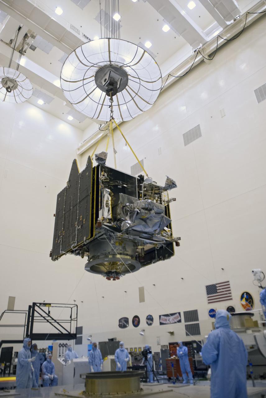 CAPE CANAVERAL, Fla. – A crane lifts NASA’s Mars Atmosphere and Volatile Evolution MAVEN spacecraft inside the Payload Hazardous Servicing Facility on Aug. 3, 2013, at the agency’s Kennedy Space Center in Florida. MAVEN will be prepared inside the facility for its scheduled November launch to Mars. Positioned in an orbit above the Red Planet, MAVEN will study the upper atmosphere of Mars in unprecedented detail. Photo credit: NASA/Tim Jacobs