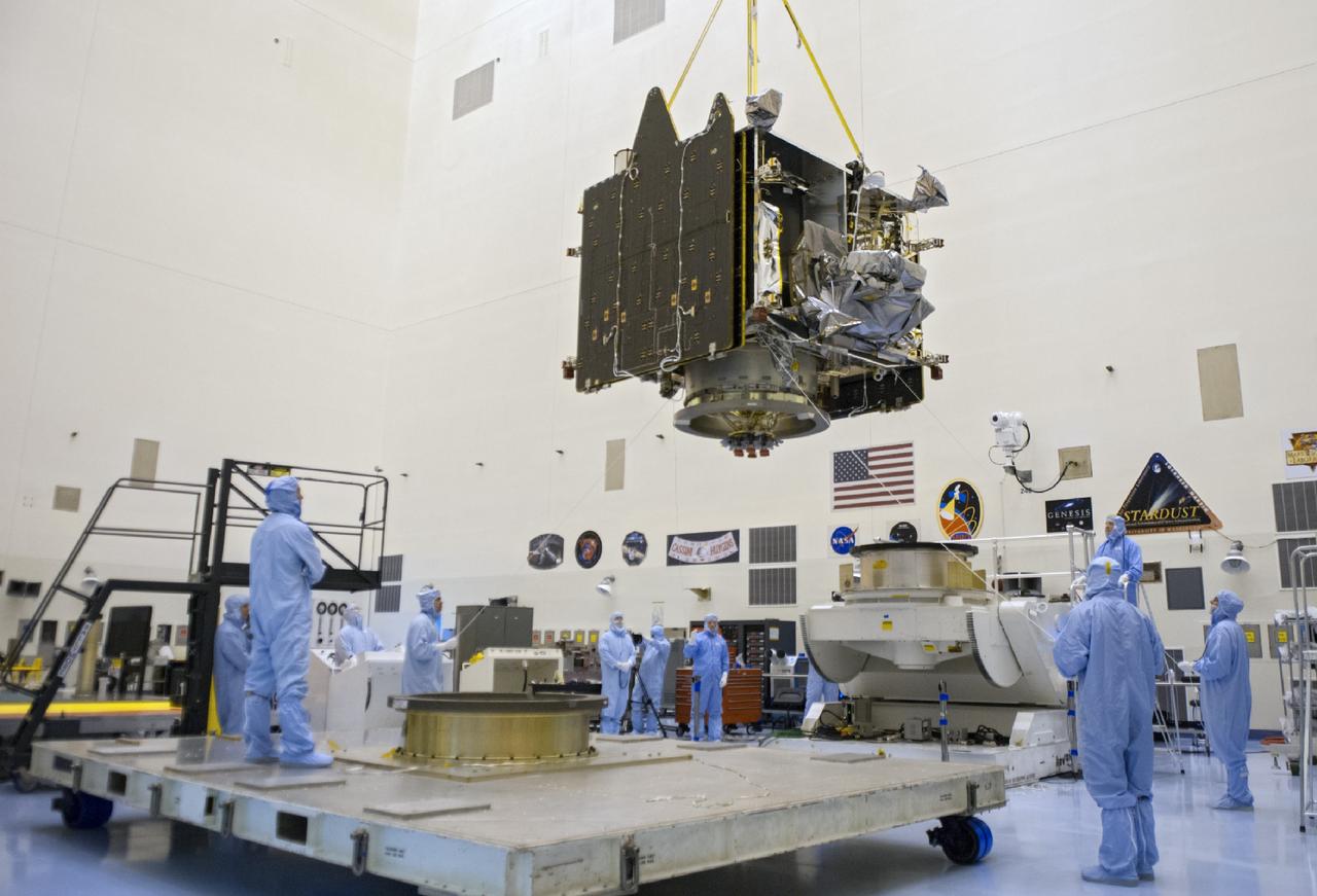 CAPE CANAVERAL, Fla. – A crane lifts NASA’s Mars Atmosphere and Volatile Evolution MAVEN spacecraft inside the Payload Hazardous Servicing Facility on Aug. 3, 2013, at the agency’s Kennedy Space Center in Florida. MAVEN will be prepared inside the facility for its scheduled November launch to Mars. Positioned in an orbit above the Red Planet, MAVEN will study the upper atmosphere of Mars in unprecedented detail. Photo credit: NASA/Tim Jacobs