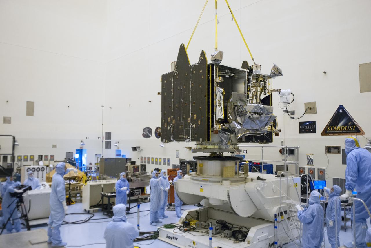 CAPE CANAVERAL, Fla. – A crane lowers NASA’s Mars Atmosphere and Volatile Evolution MAVEN spacecraft onto a processing stand inside the Payload Hazardous Servicing Facility on Aug. 3, 2013, at the agency’s Kennedy Space Center in Florida. MAVEN will be prepared inside the facility for its scheduled November launch to Mars. Positioned in an orbit above the Red Planet, MAVEN will study the upper atmosphere of Mars in unprecedented detail. Photo credit: NASA/Tim Jacobs