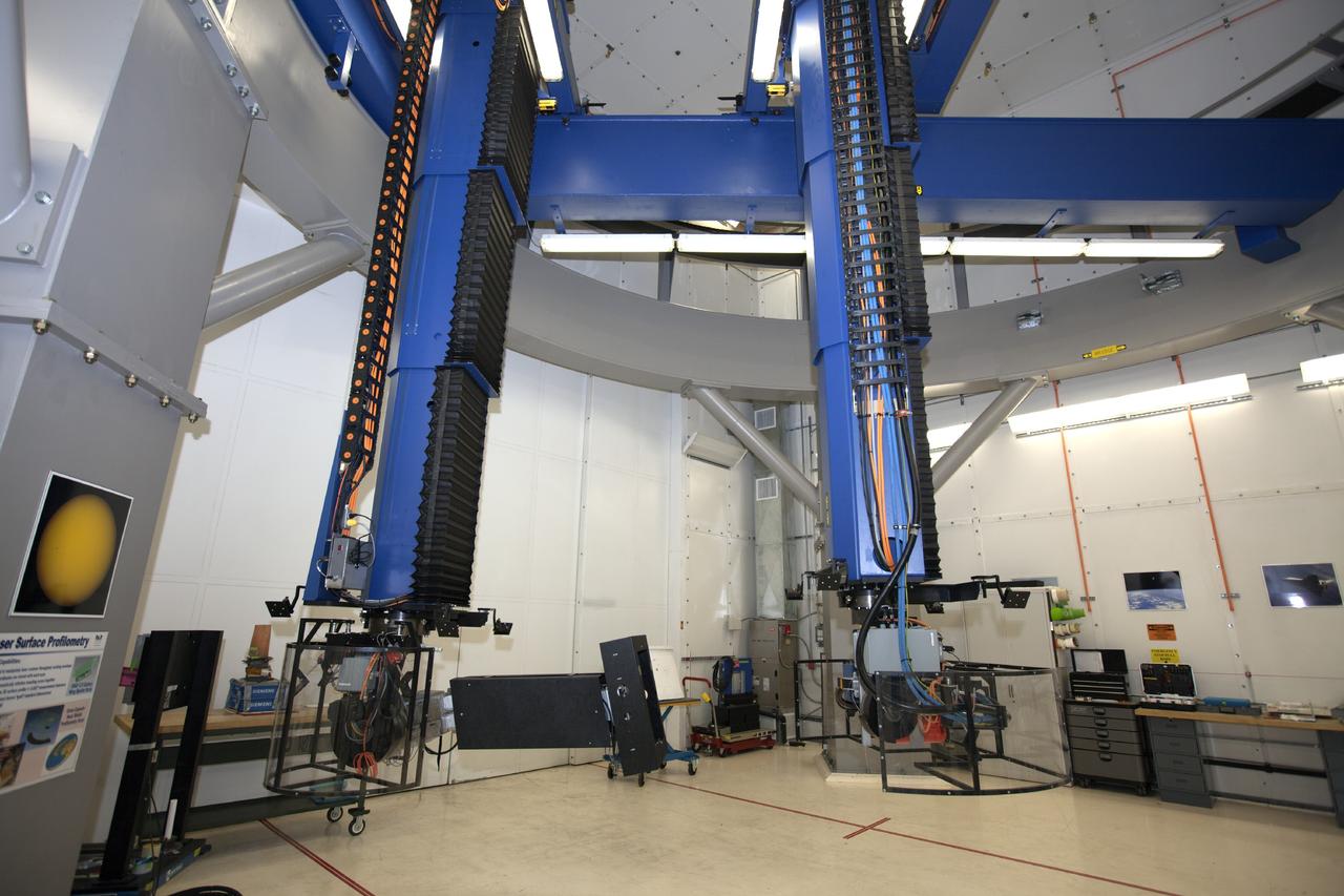 CAPE CANAVERAL, Fla. – In Hangar N at Cape Canaveral Air Force Station, an 11-axis robotic X-ray system takes images of hardware for evaluation. The activity is part of work performed by PaR Systems, Inc. under a partnership agreement with NASA.      NASA's Kennedy Space Center in Florida recently established a partnership agreement with PaR Systems, Inc. of Shoreview, Minn., for operation of the Hangar N facility and its nondestructive testing and evaluation equipment. As the spaceport transitions from a historically government-only launch facility to a multi-user spaceport for both federal and commercial customers, partnerships between the space agency and other organizations will be a key element in that effort. Hangar N is located at Cape Canaveral Air Force Station adjacent to Kennedy and houses a unique inventory of test and evaluation equipment and the capability for current and future mission spaceflight support. Photo credit: NASA/ Dimitri Gerondidakis