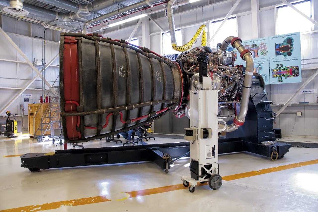 CAPE CANAVERAL, Fla. – As seen on Google Maps, a Space Shuttle Main Engine, or SSME, stands inside the Engine Shop at Orbiter Processing Facility 3 at NASA's Kennedy Space Center. Each orbiter used three of the engines during launch and ascent into orbit. The engines burn super-cold liquid hydrogen and liquid oxygen and each one produces 155,000 pounds of thrust. The engines, known in the industry as RS-25s, could be reused on multiple shuttle missions. They will be used again later this decade for NASA's Space Launch System rocket. Google precisely mapped the space center and some of its historical facilities for the company's map page. The work allows Internet users to see inside buildings at Kennedy as they were used during the space shuttle era. Photo credit: Google/Wendy Wang