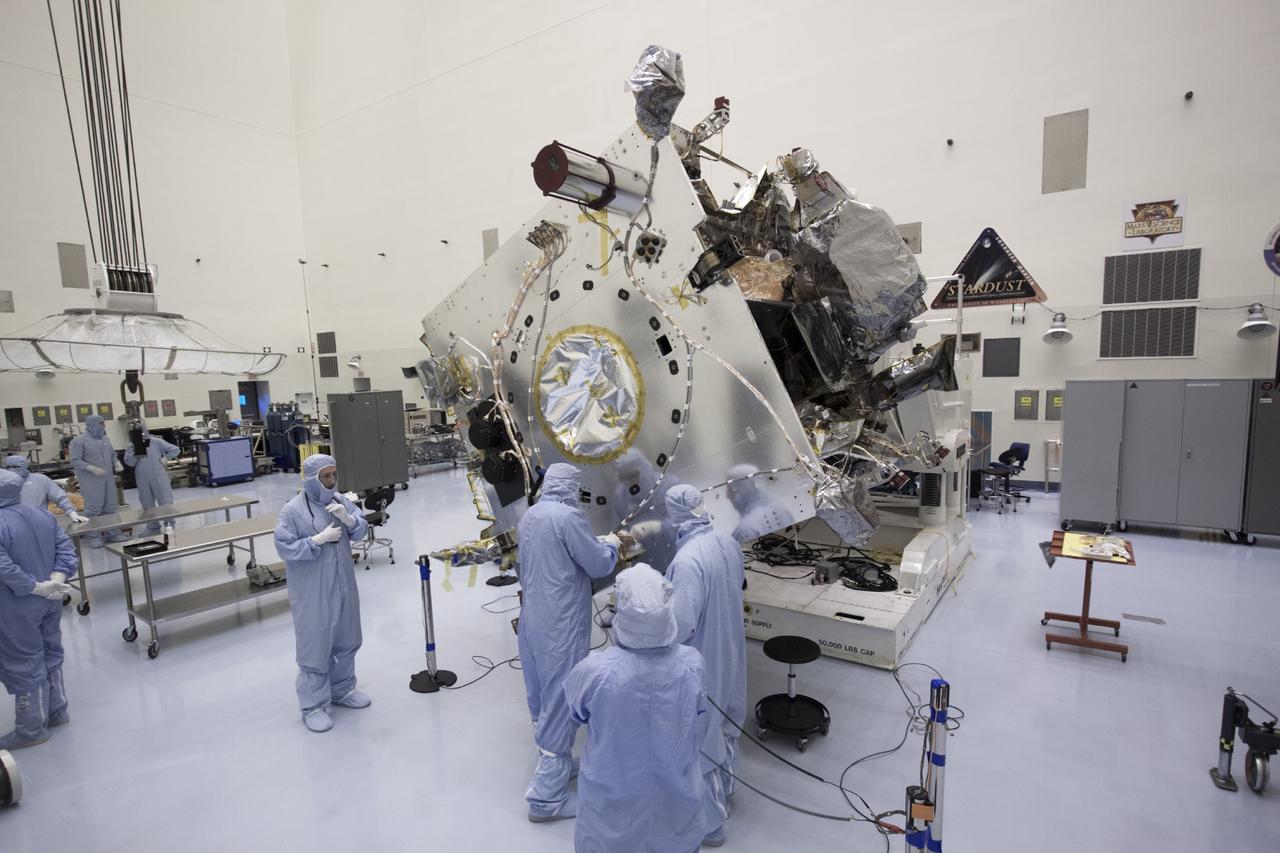CAPE CANAVERAL, Fla. – Inside the Payload Hazardous Servicing Facility at NASA's Kennedy Space Center in Florida, technicians prepare the Mars Atmosphere and Volatile Evolution, or MAVEN spacecraft, to receive its parabolic high gain antenna.     The antenna will communicate vast amounts of data to Earth during the mission. MAVEN is being prepared inside the facility for its scheduled November launch aboard a United Launch Alliance Atlas V rocket to Mars. Positioned in an orbit above the Red Planet, MAVEN will study the upper atmosphere of Mars in unprecedented detail. Photo credit: NASA/Jim Grossmann